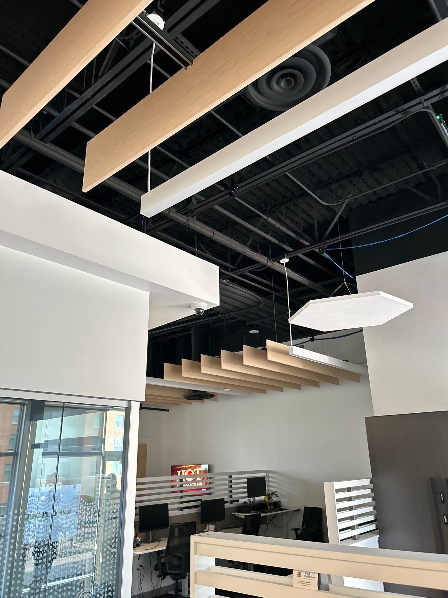 Office Remodel Featuring Acoustic Baffles and Professional Carpet Installation by CompanyCam Sales Demo