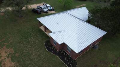 Aerial view of a completed standing seam metal roof.