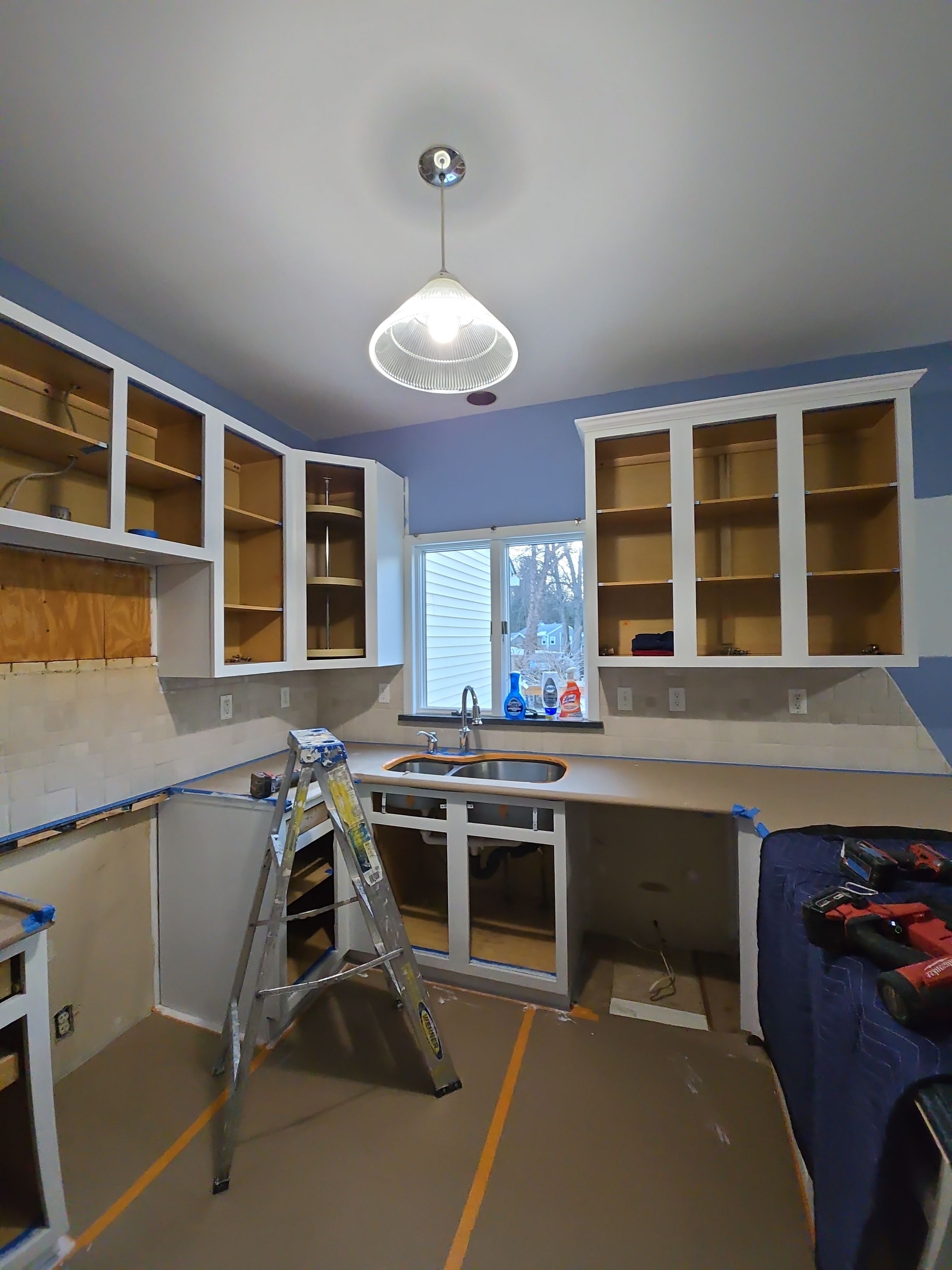 Cabinet Refinishing using Benjamin Moore Command by Spectrum Painting, LLC