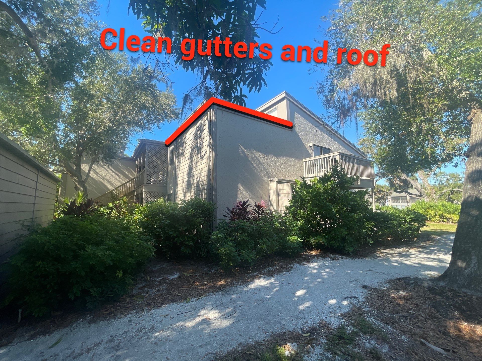 Clean Gutters and Roof in Sarasota FL by Gutter Professors