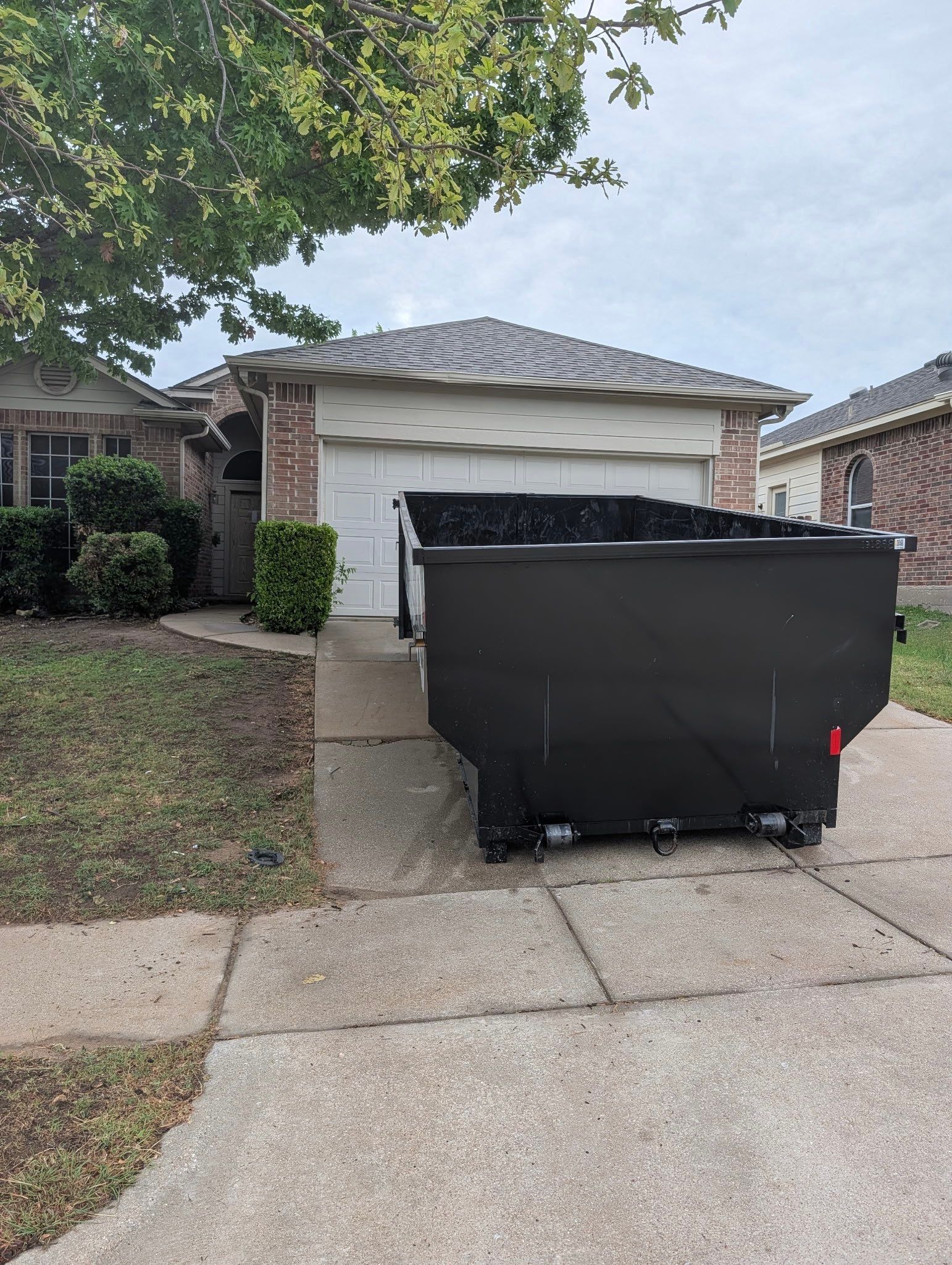 Fort Worth Dumpster by REH Construction, LLC.