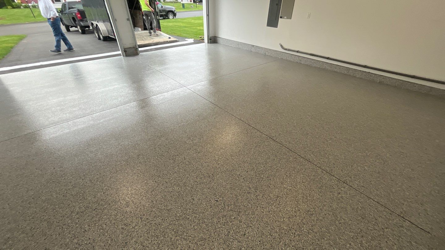 Garage in Londonderry, NH 03053 by Symphony Concrete Coatings