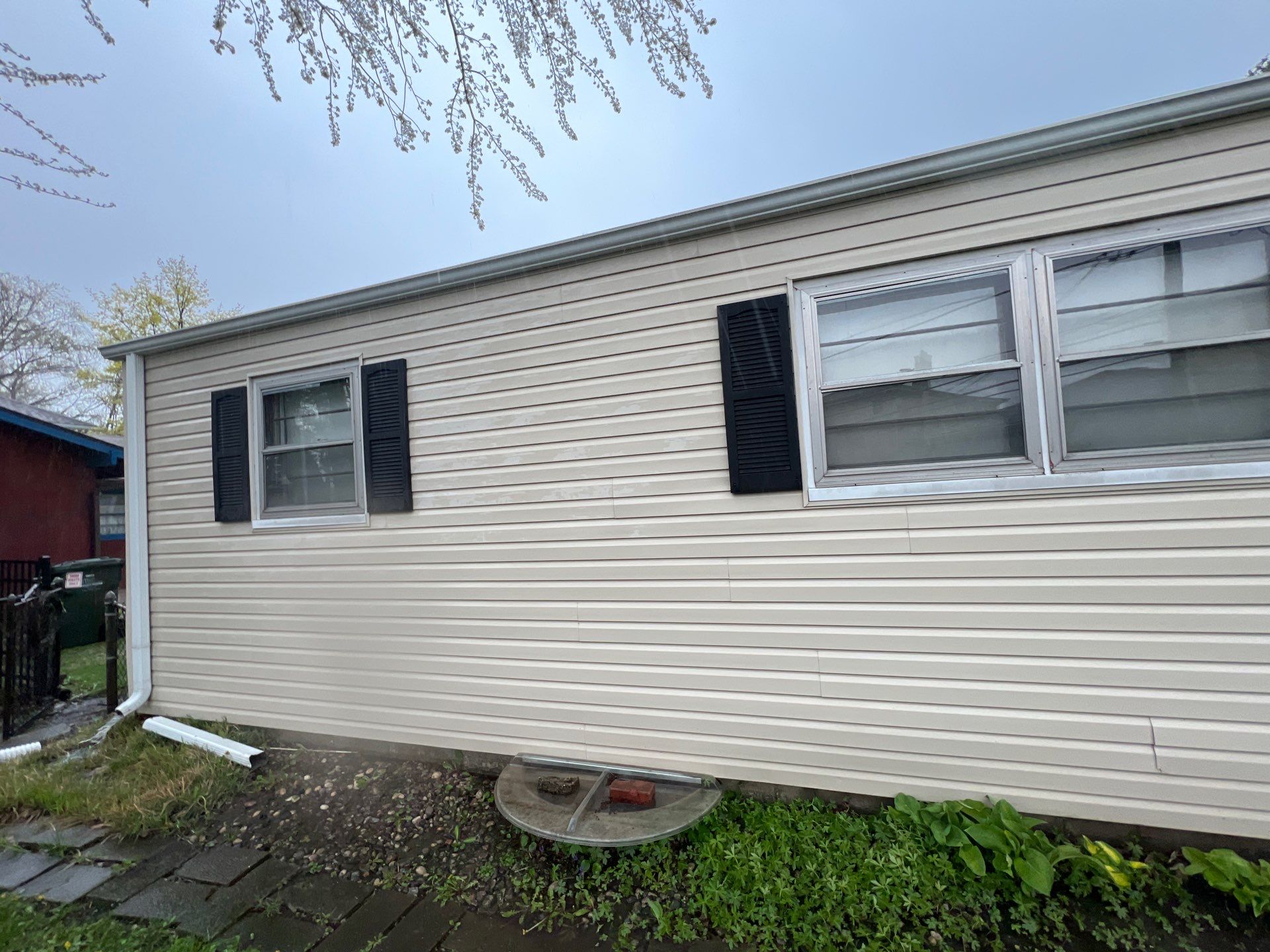 Housewashing  using Algaecide, soft wash soap by Northern Power Washing LLC.