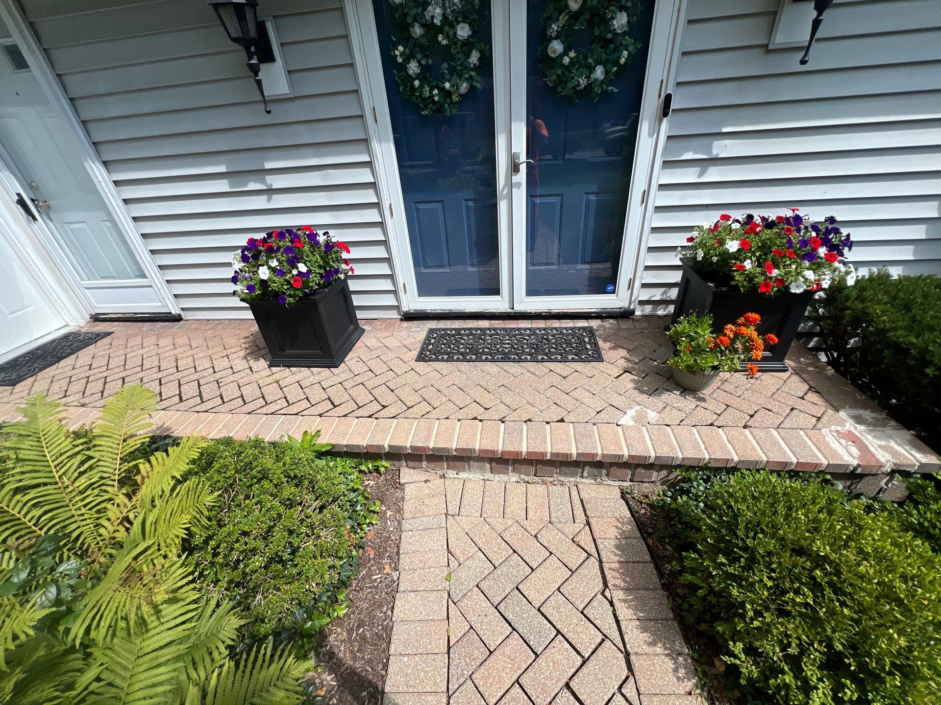 Brick paver clean, sand and seal.  using Polysweep polymeric sand by Northern Power Washing LLC.