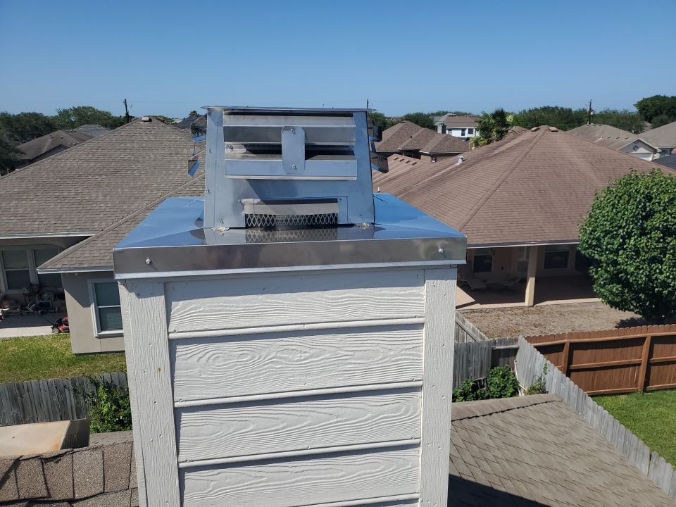 Chimney Cap Replacement using Custom Fabricated Stainless Steel by Lighthouse Roofing