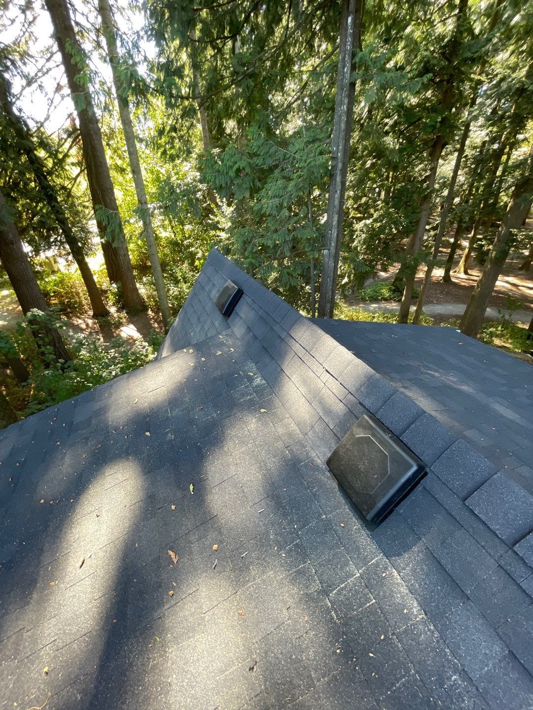 Residential Roofing Installation using OC Oakridge shingles by Top Notch Roofing Inc