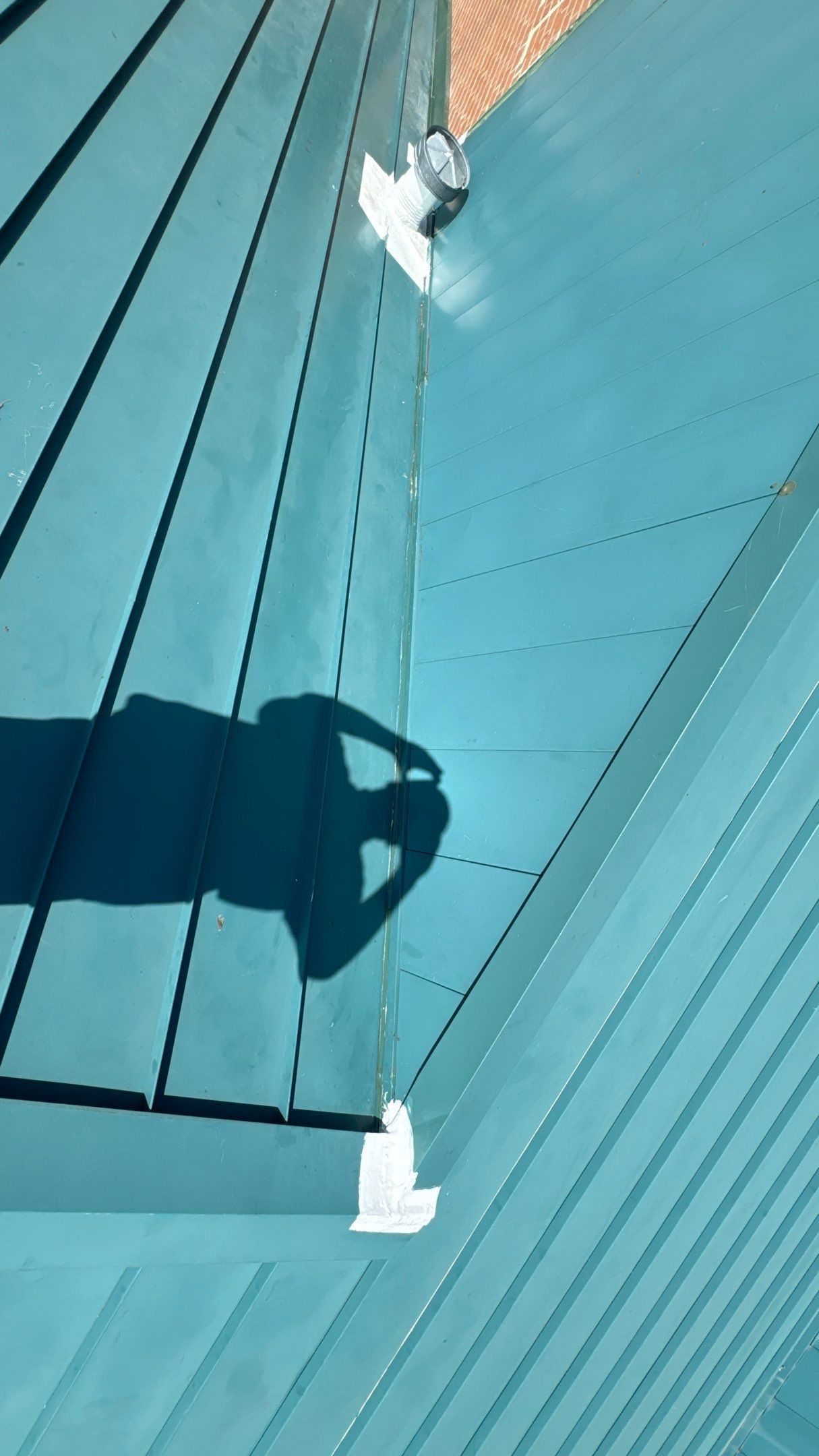 Commercial Roofing Repair using TRP #924 Eterna-Sil Premium Silicone Roof Coating by Harvey Roofing & Construction