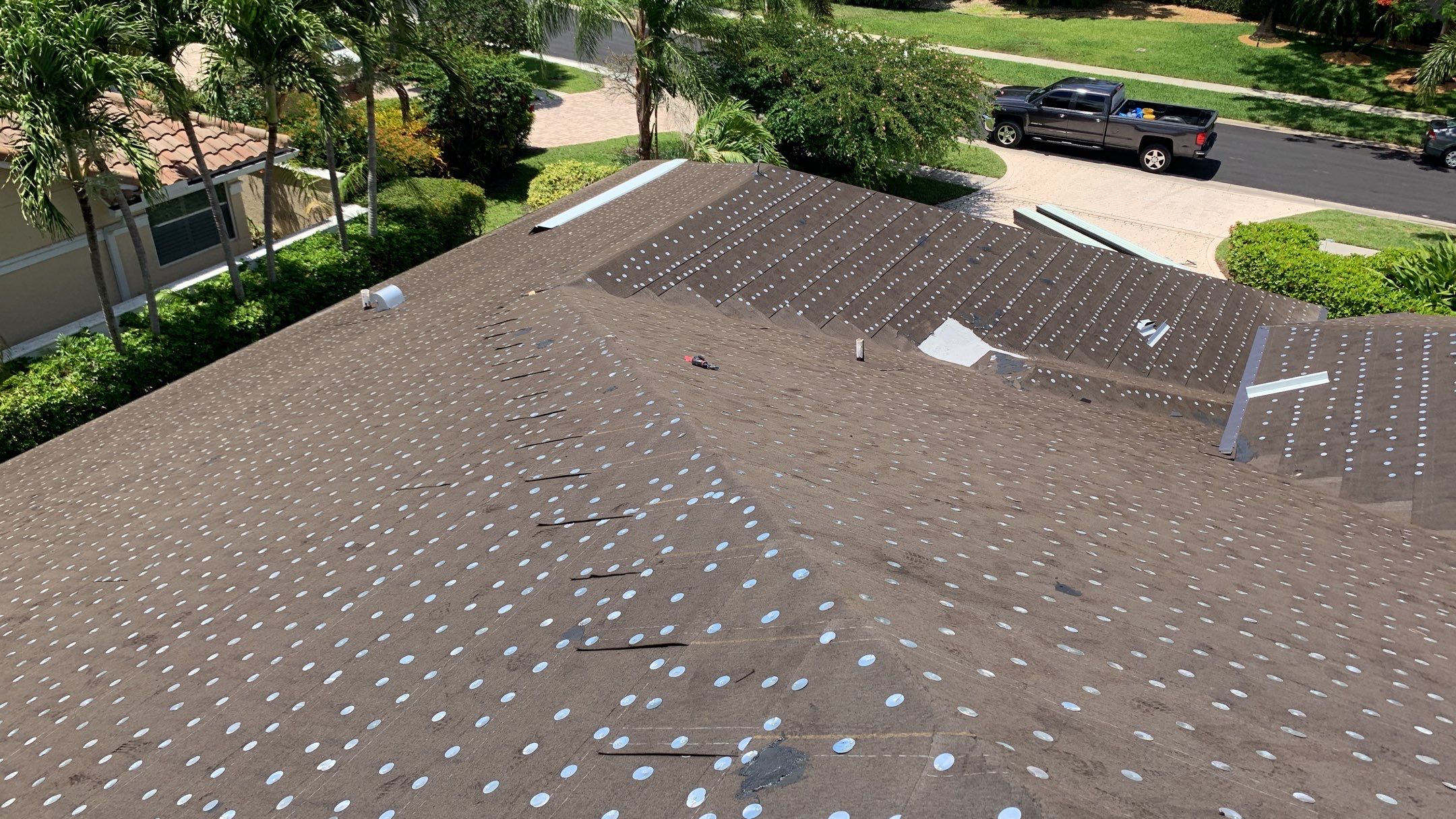 Residential Roofing Installation using 1" Nail strip metal roof by BLUES BROTHERS ROOFING