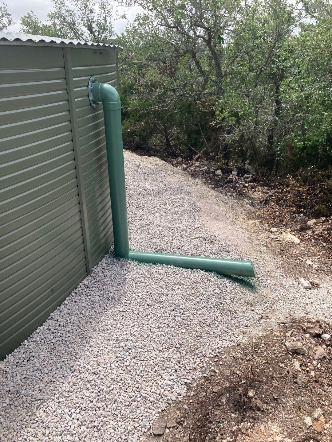 Residential Rainwater Collection System - Pioneer 40K gallon water tank in Mangrove Green by Hill Country Rain Water