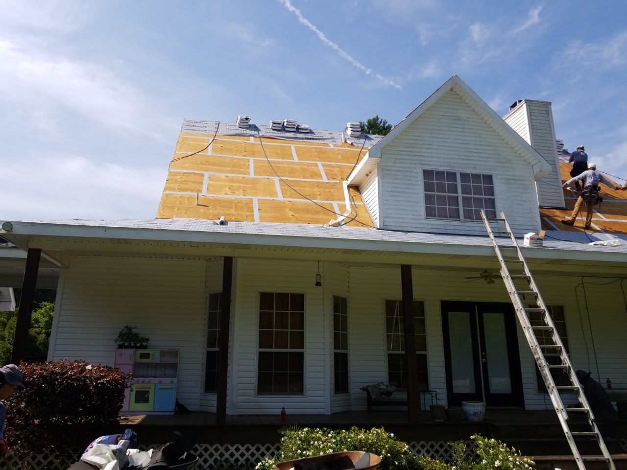 Residential Roofing Installation using Roof Replacement by American Roofing & Construction LLC