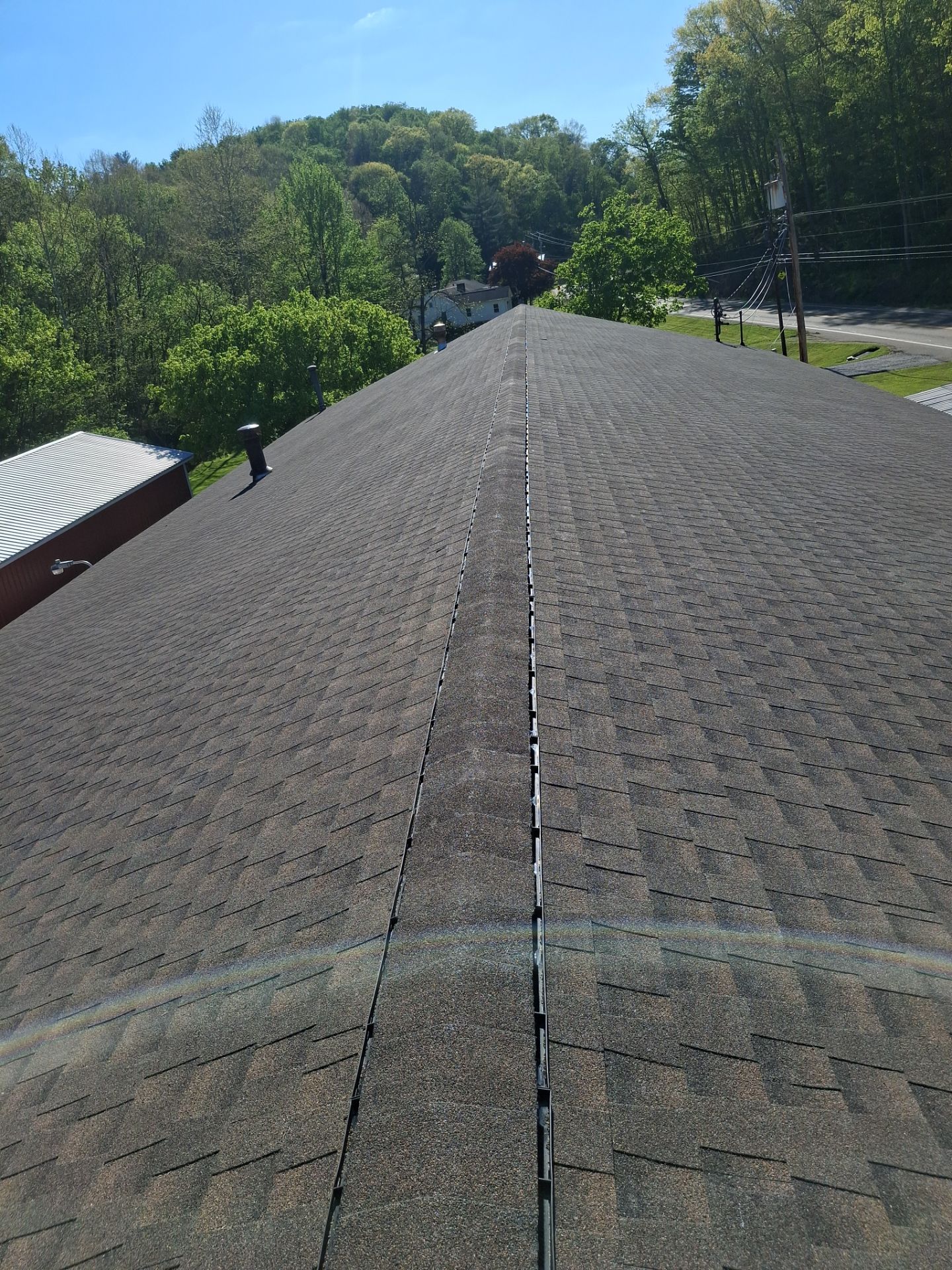 Commercial Roofing Installation using GAF Timberline HDZ Barkwood by Rainstoppers Roofing