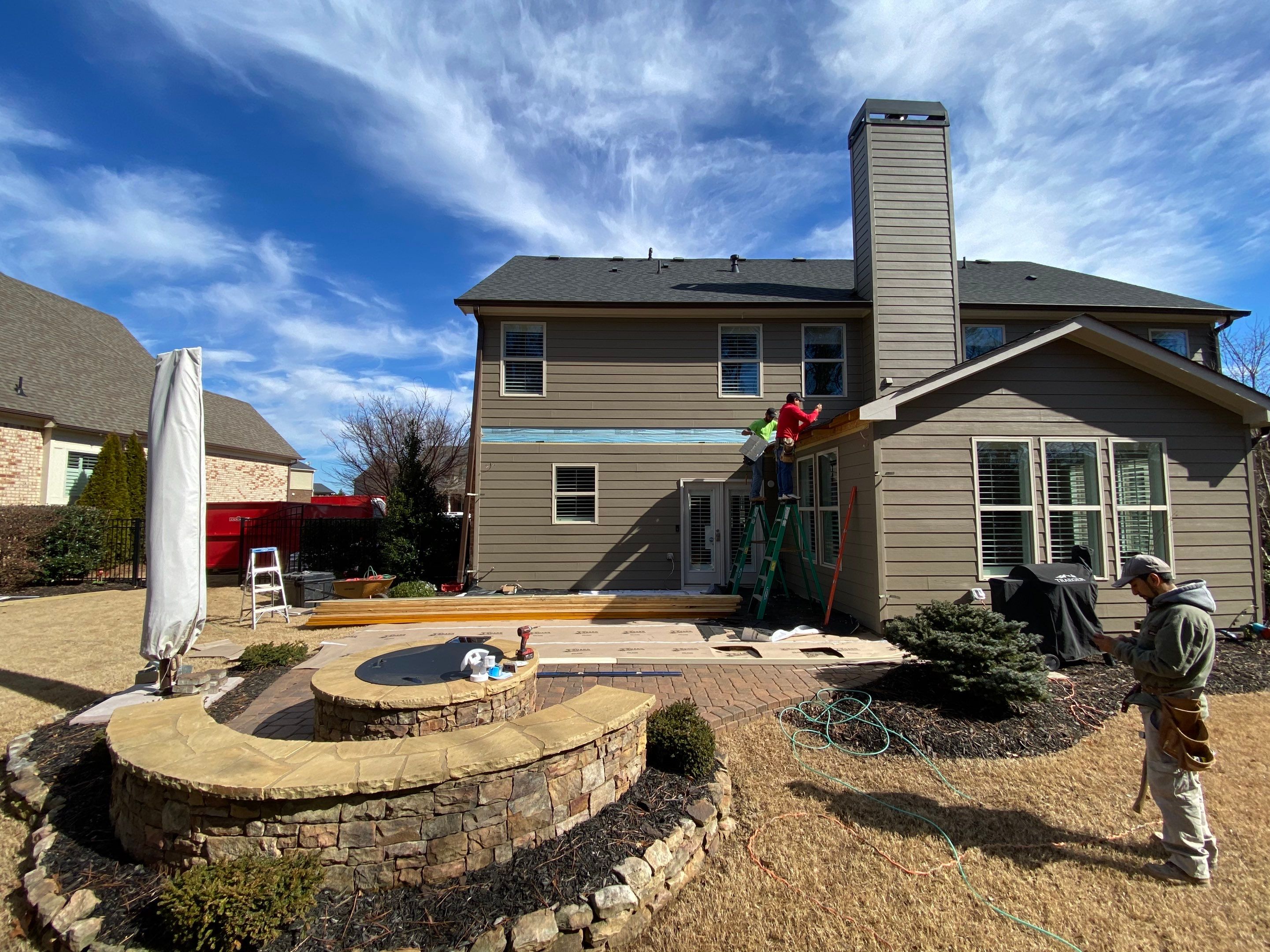 Custom Screened Porch Addition with Vaulted Wood Ceilings in Woodstock by Swift Home Renovations