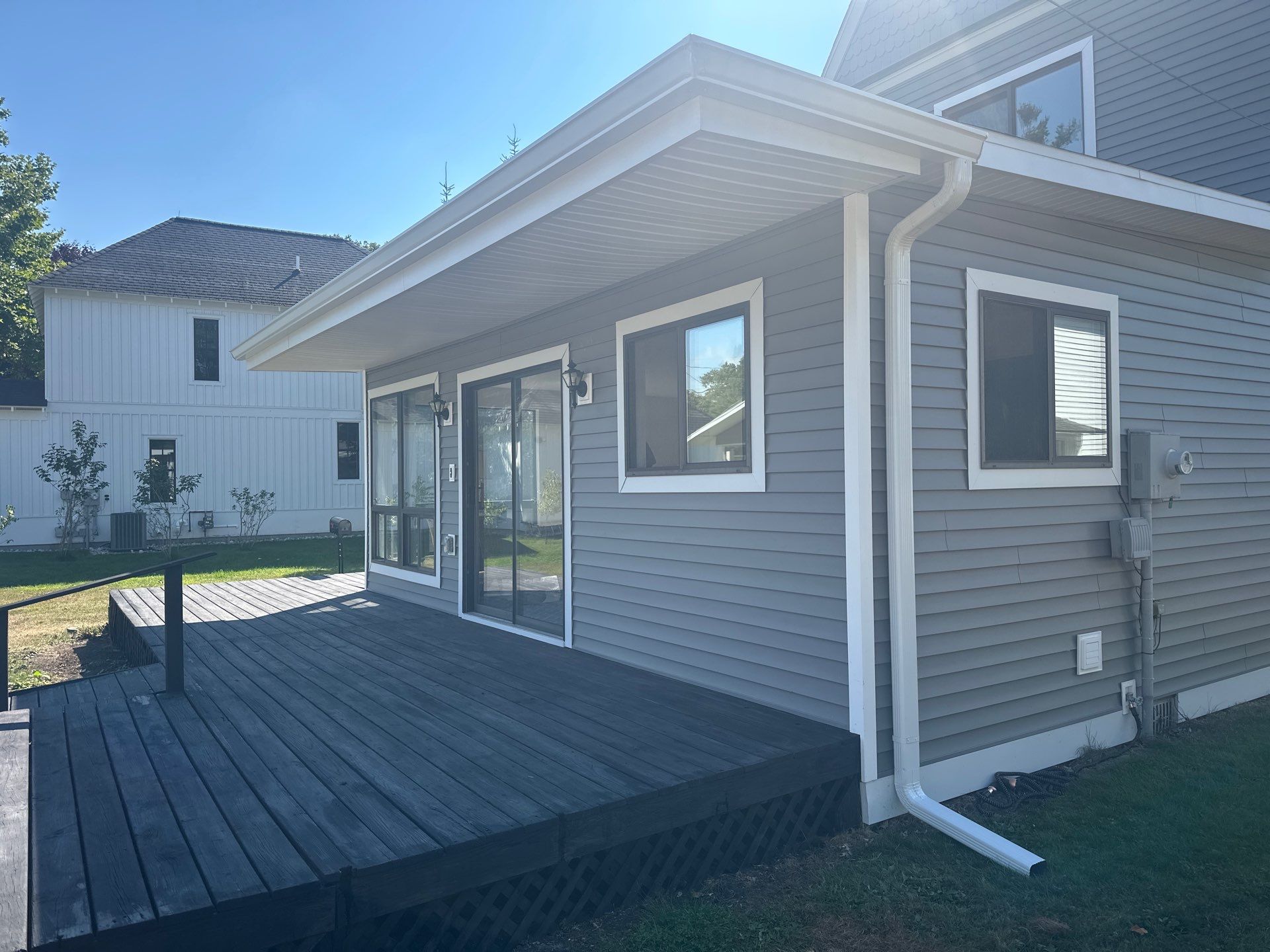 Complete Gutter and Downspout Installation in Charlevoix by Rainbow Seamless Systems