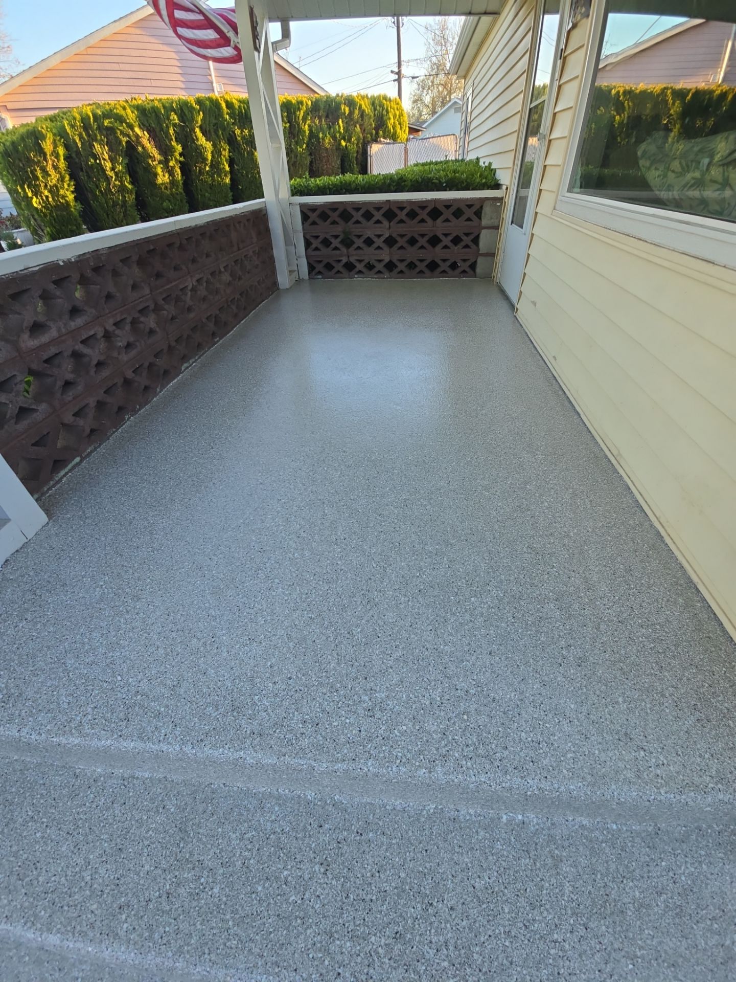 Limestone Hybrid Concrete Porch and Step Transformation in Richland by Croc Coatings, LLC