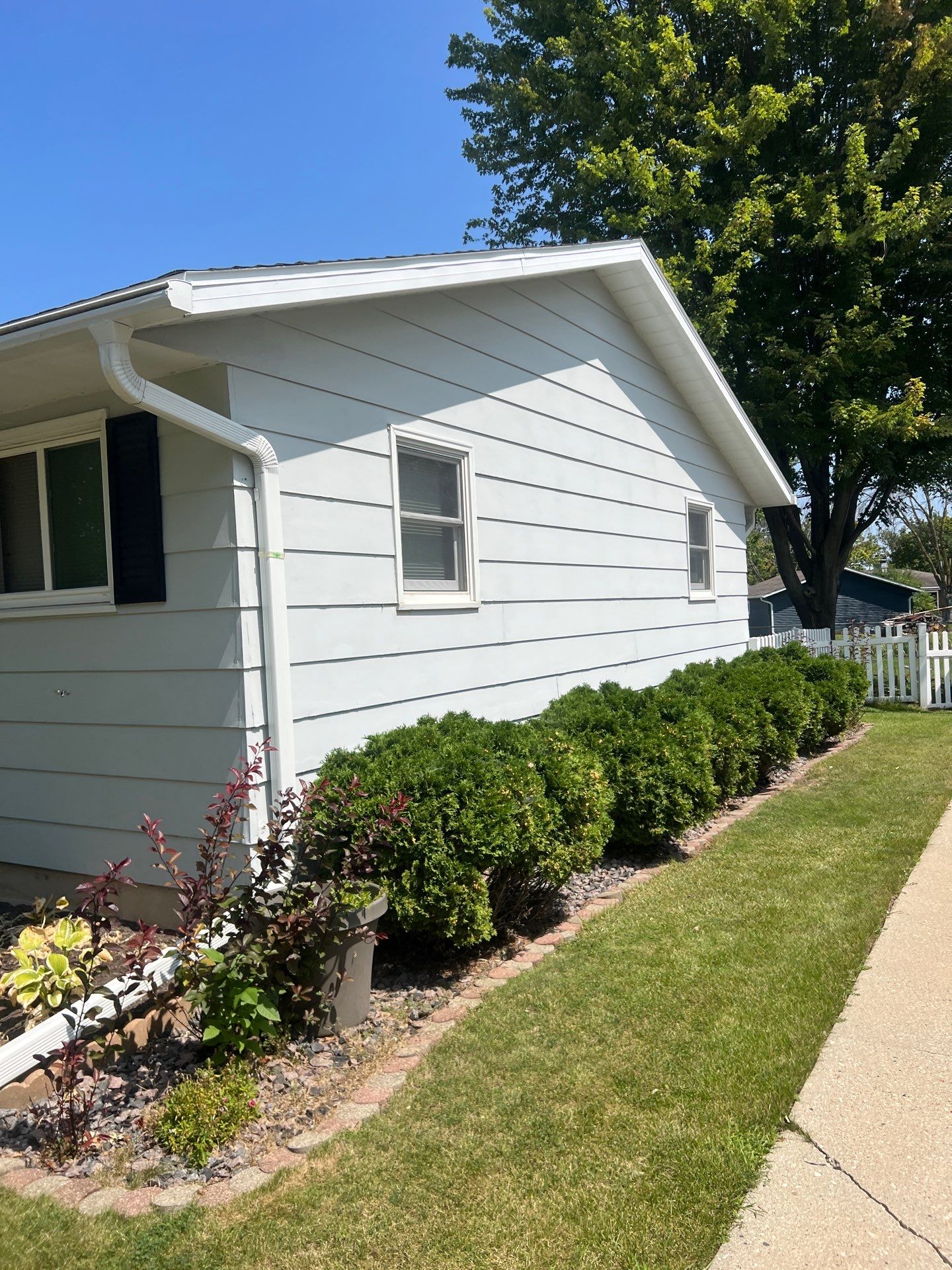 Siding Replacement with Vinyl Siding in Granite Gray by Gellings Roofing & Siding