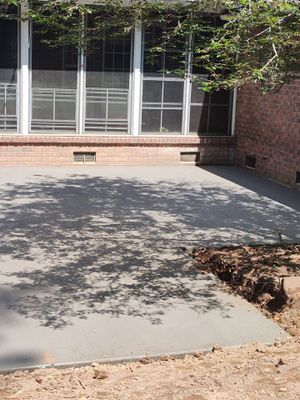 Patio in concrete with drainage improvements