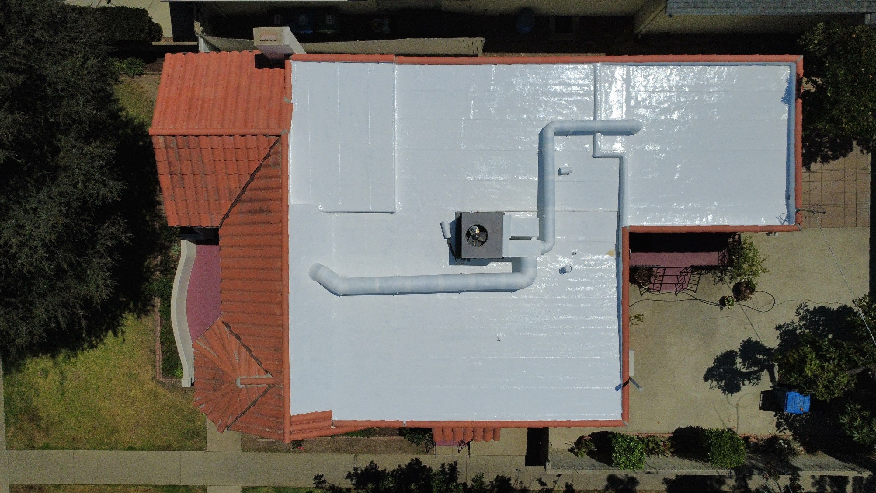 Tile Reset and Silicone Membrane Installation by Hull Brothers Roofing