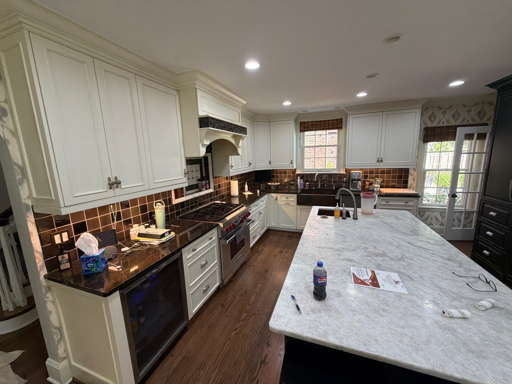 Custom Kitchen Cabinet Refinishing and Hardware Update in Grosse Pointe by Top Shelf Painter