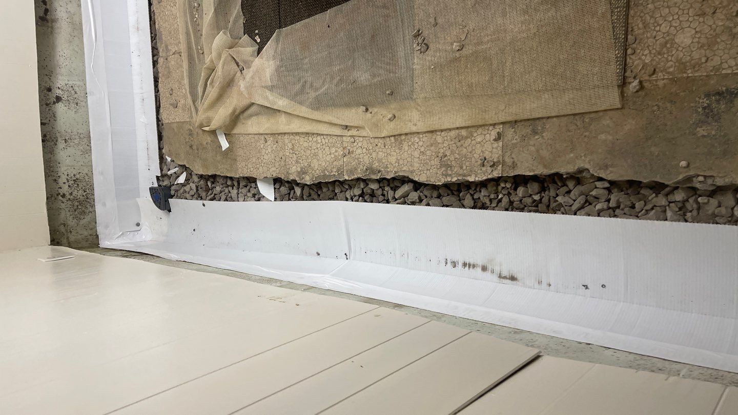 Interior Waterproofing Using GrateDrain™ Products by Toledo Basement Repair 