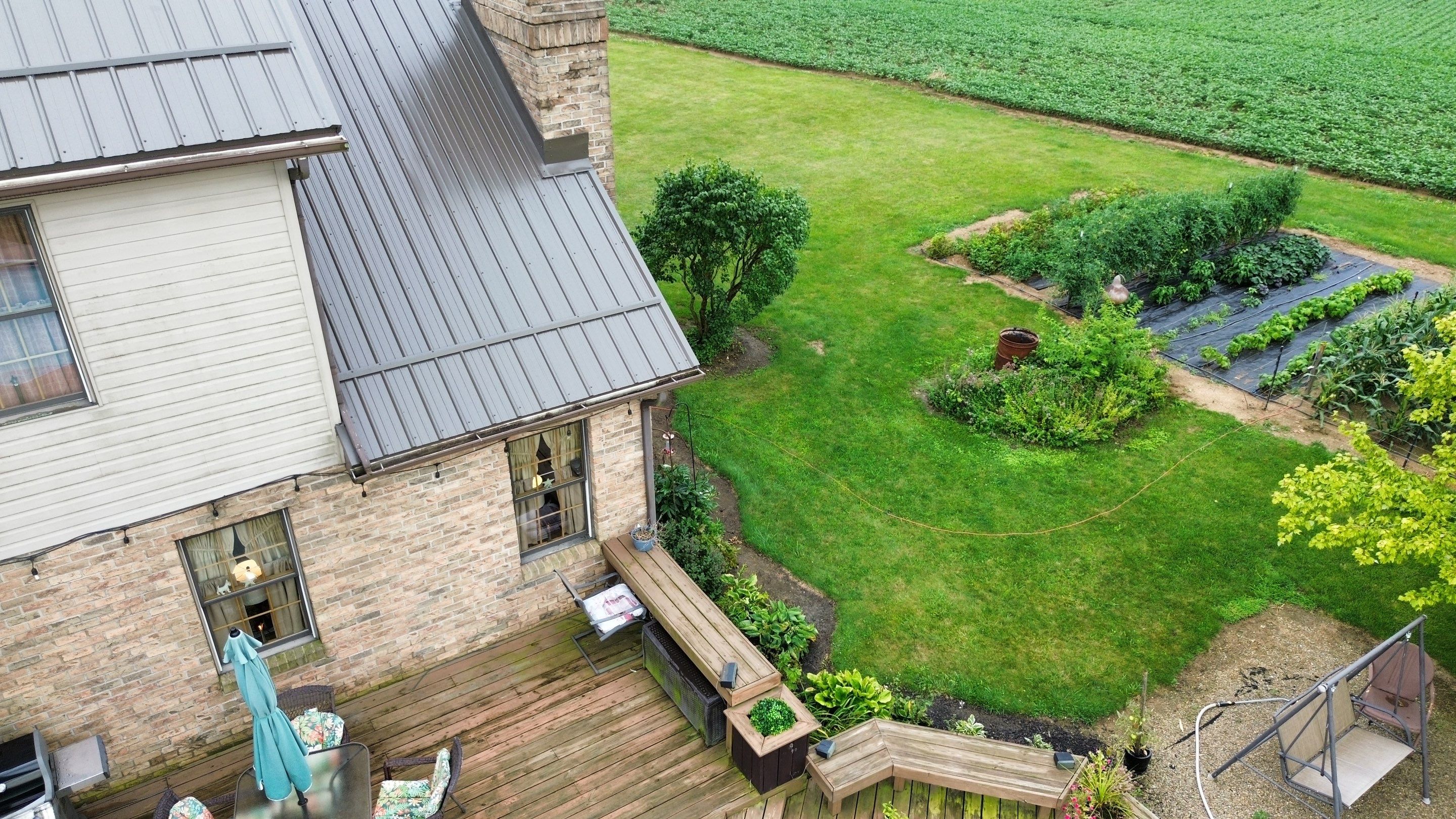 Residential Roofing Installation using Performance Panel Metal - Burnished Slate by RoofX 