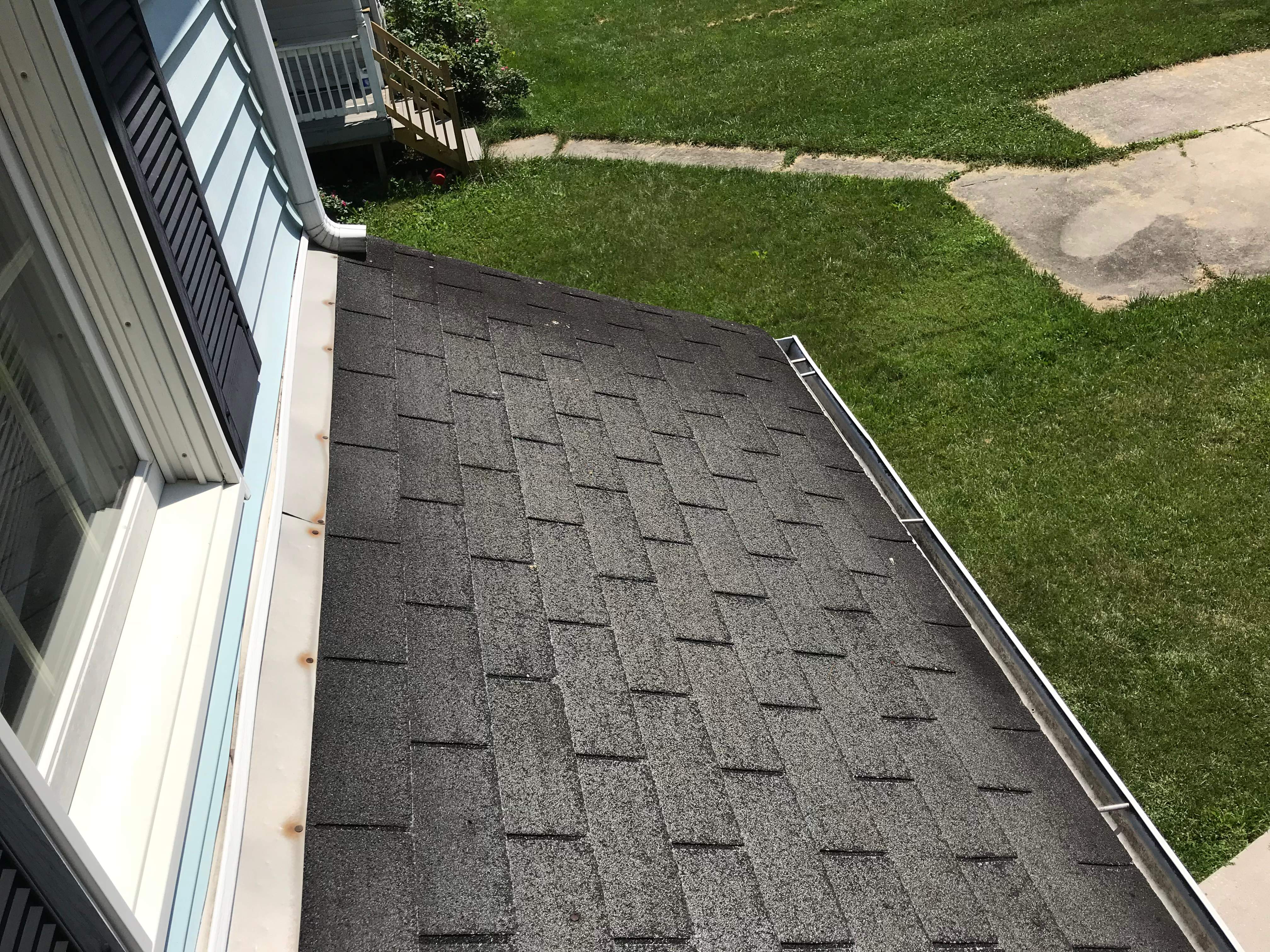 Residential Roofing Installation using Silver Birch Shingles  by Alpha Design Services