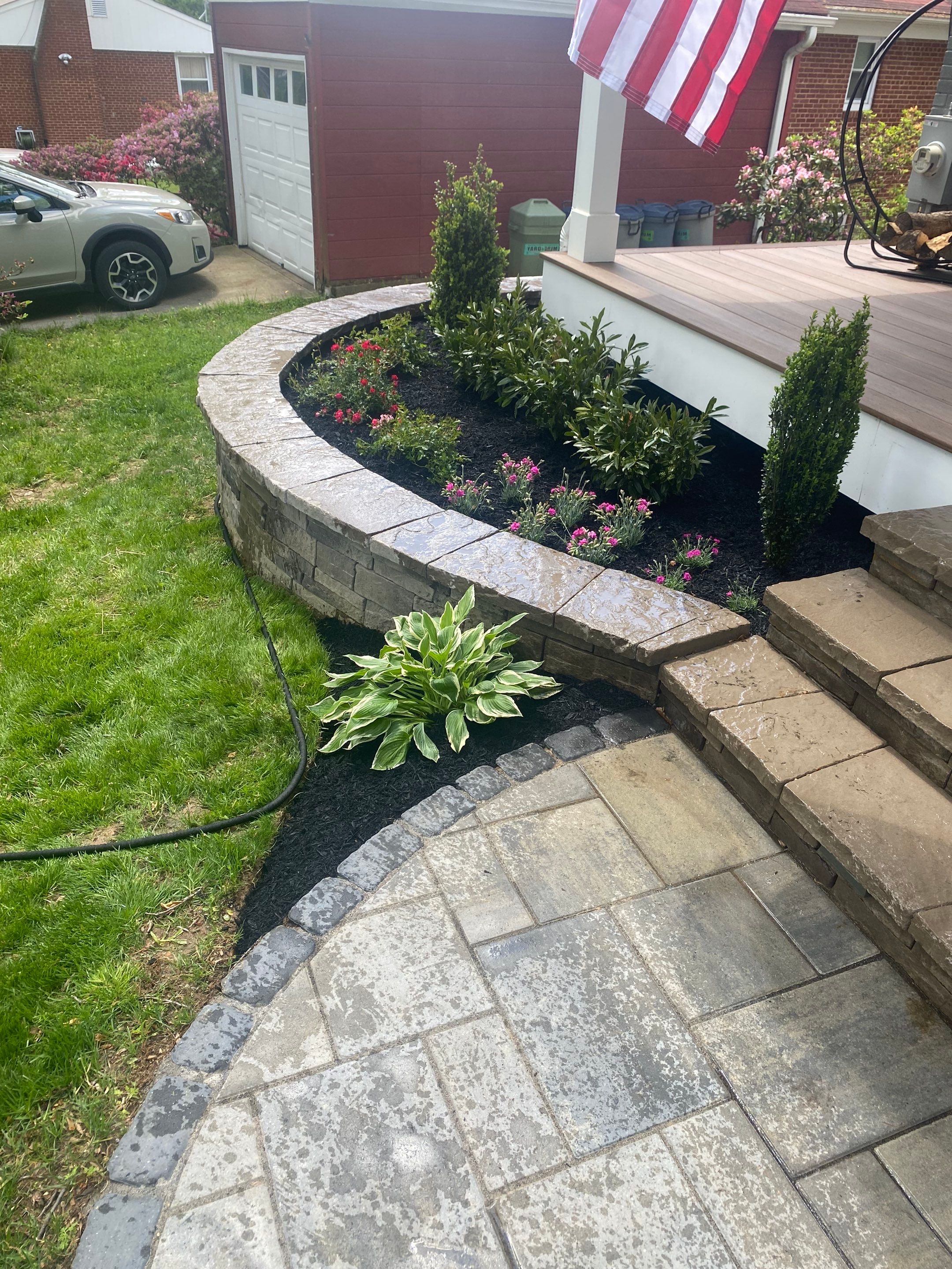 Retaining wall, walkway, small patio and landscape install by The Smet Companies, LLC