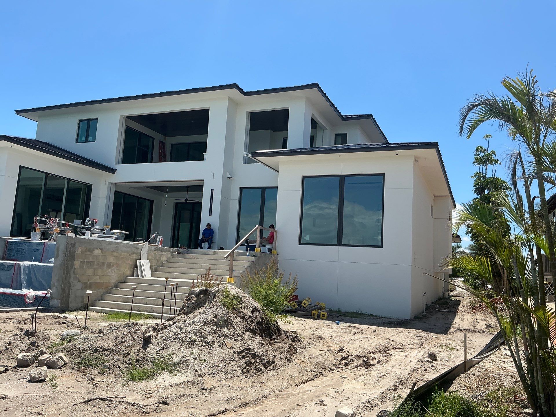 Seamless Aluminum Gutter Installation using black seamless gutters in Sarasota FL by Gutter Professors