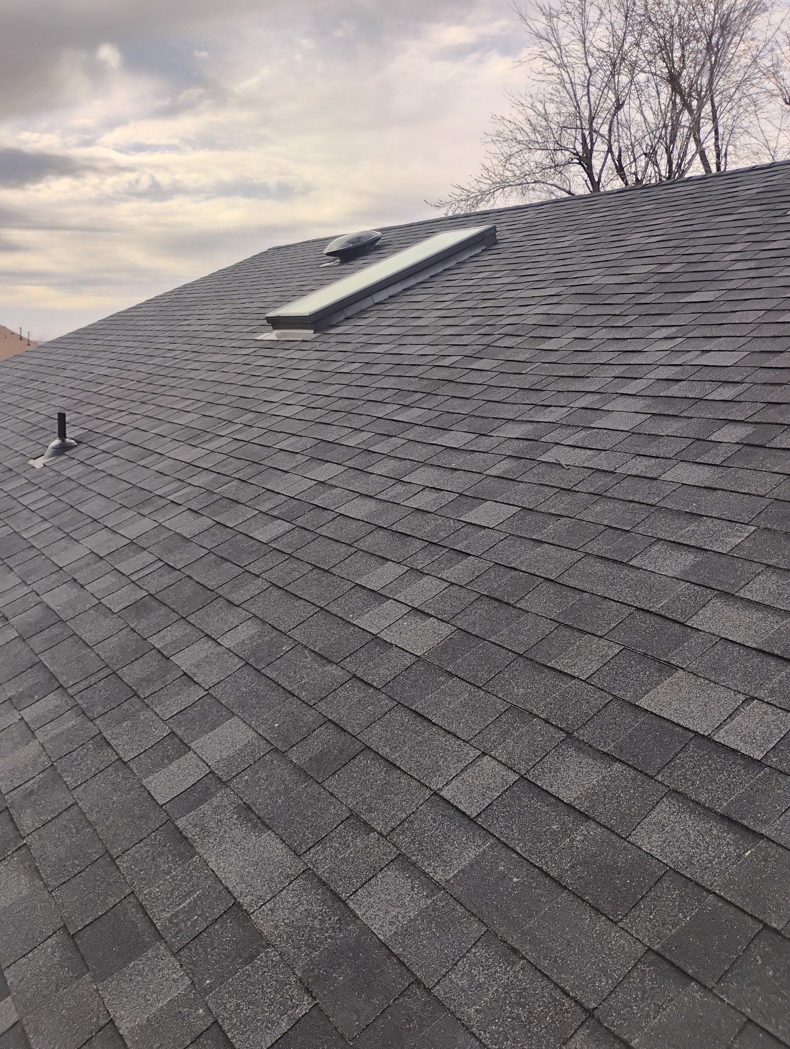 roof replacement & skylight installation & gutter installation in Oklahoma City by McCann's Roofing and Construction