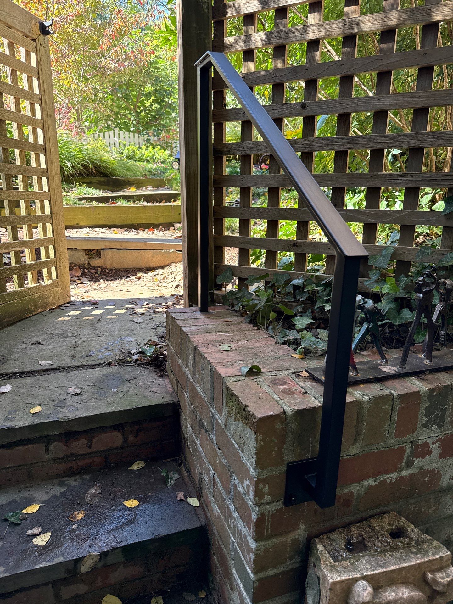 Custom Black Metal Handrail Installation for Chevy Chase Entryway Steps by Capitol Iron Works