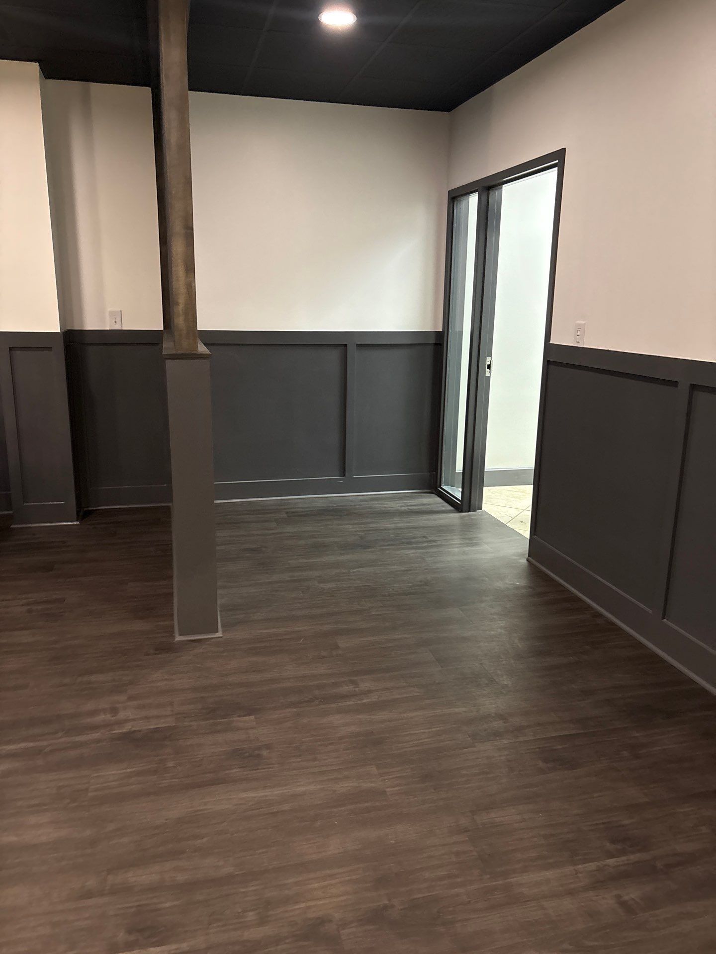 Northlake OLF - Recovery room renovation, flooring installation, front desk, accent wall by Nova HomeWorks 