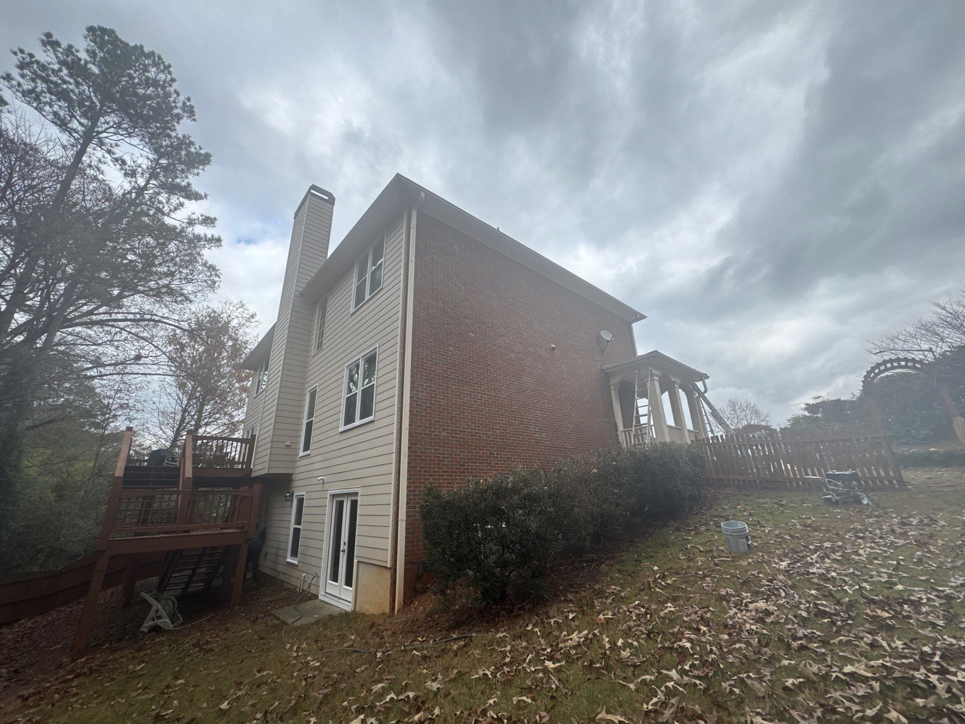 Chimney Siding Reconstruction and Full Exterior Painting in Marietta by Swift Home Renovations