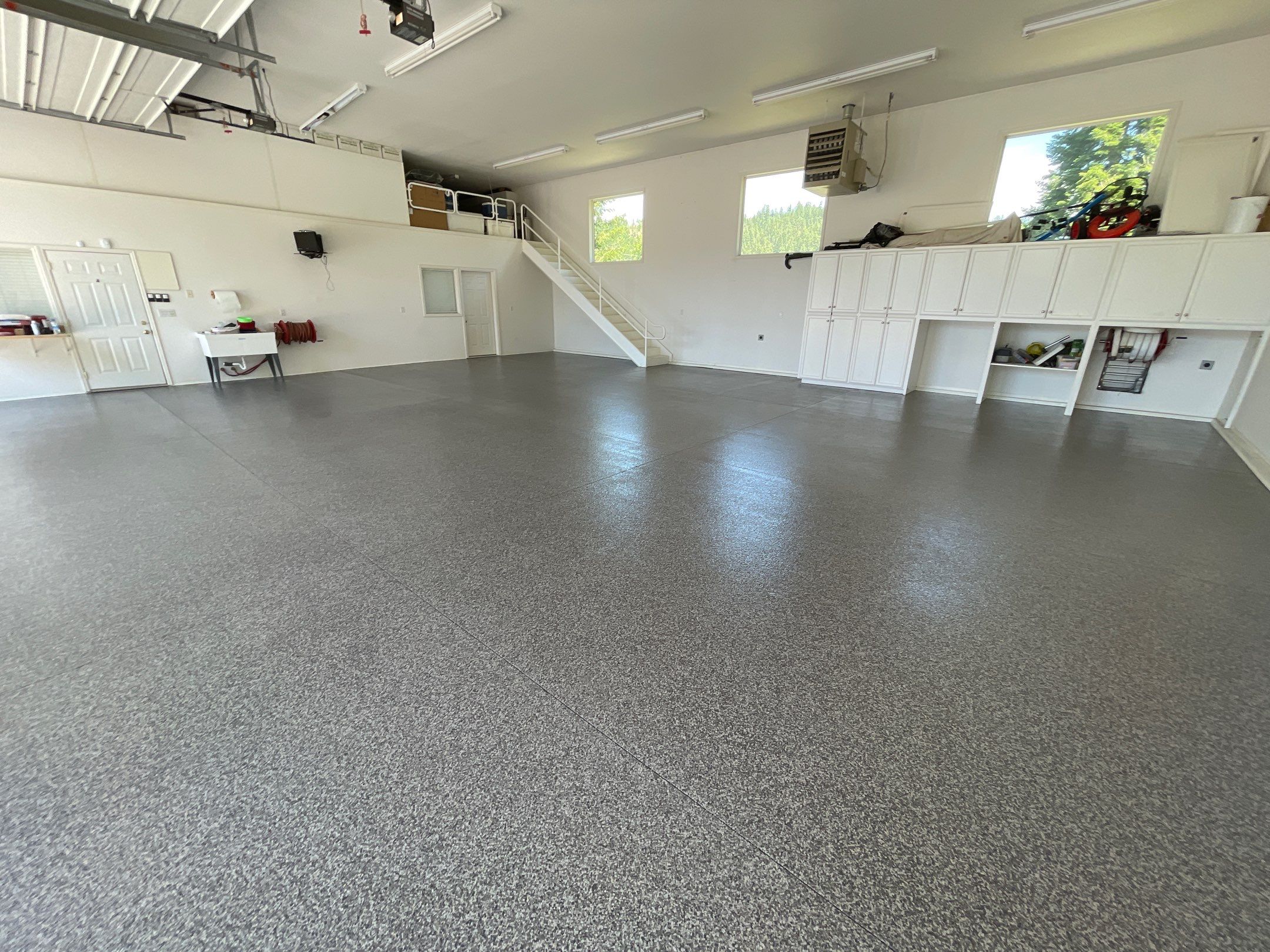 Garage Transformation using Echo 1/4" Chip by Croc Coatings, LLC