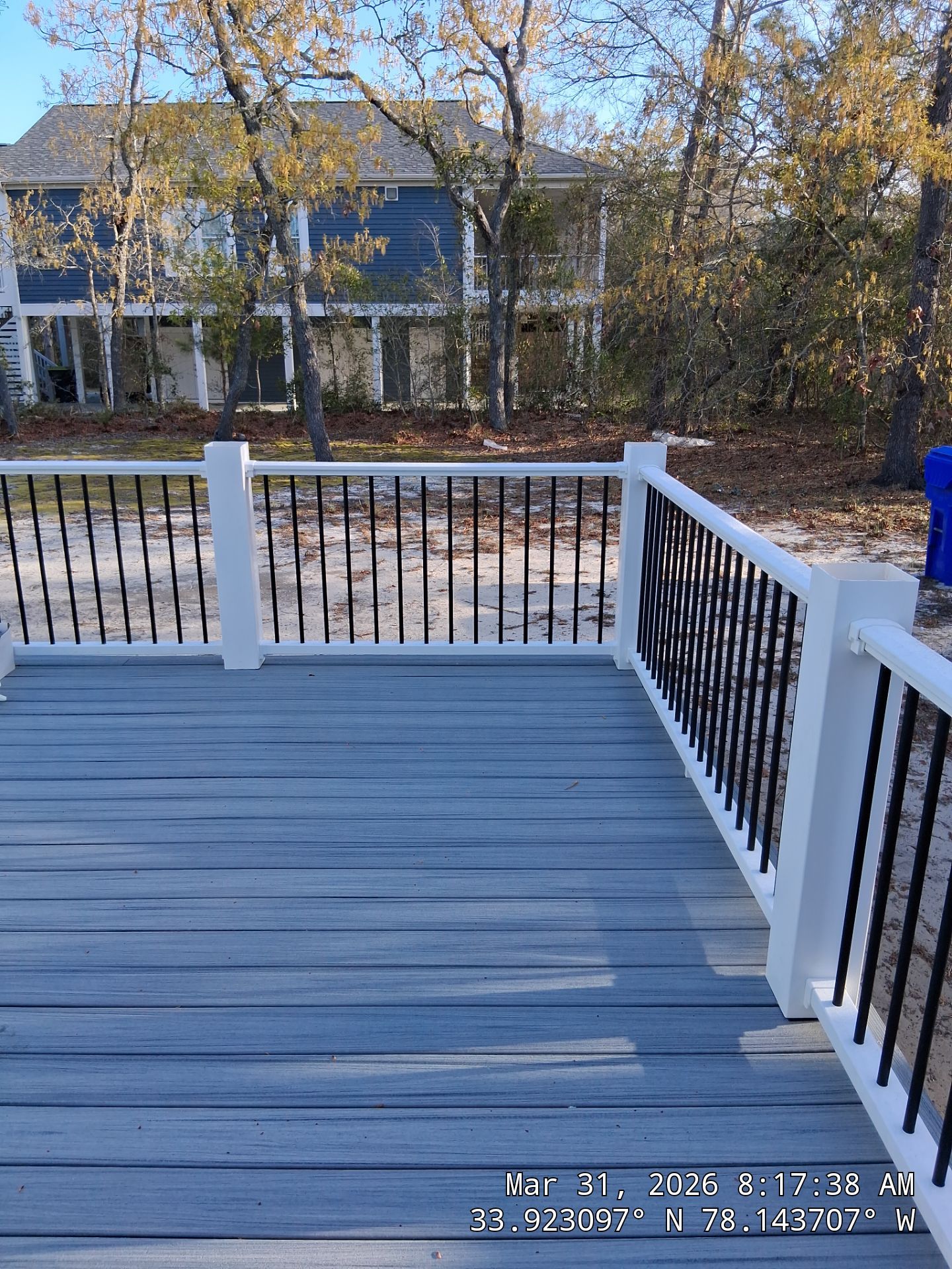 Oak Island Composite Deck Build with Trex Decking and Coastal Railings by RGR Construction and Roofing, LLC