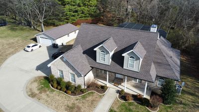 Roof and Gutter System Replacement with Stone Chimney Rebuild
