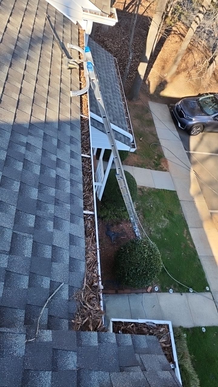 Gutter Cleaning using water by Power Wash Masters LLC