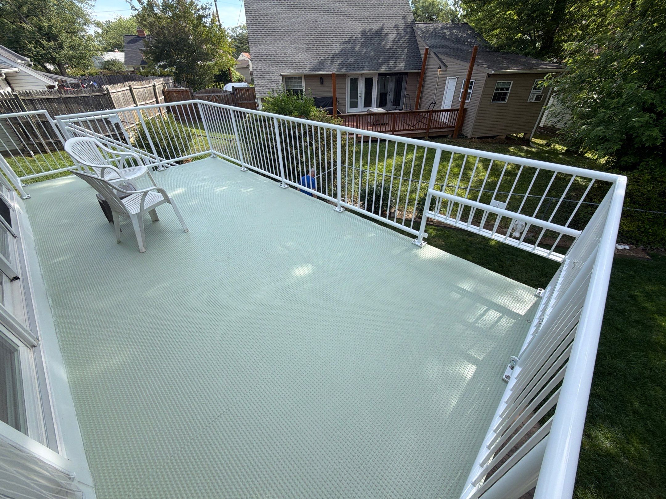 White Powder-Coated Outdoor Railings in Rockville & Staircase and Deck Refurbishment  by Capitol Iron Works
