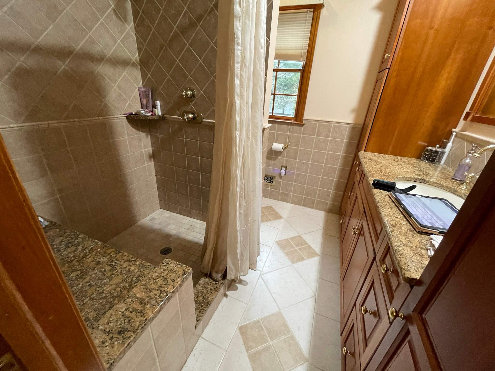 Bathroom Remodel using Tile by Home Concepts Construction