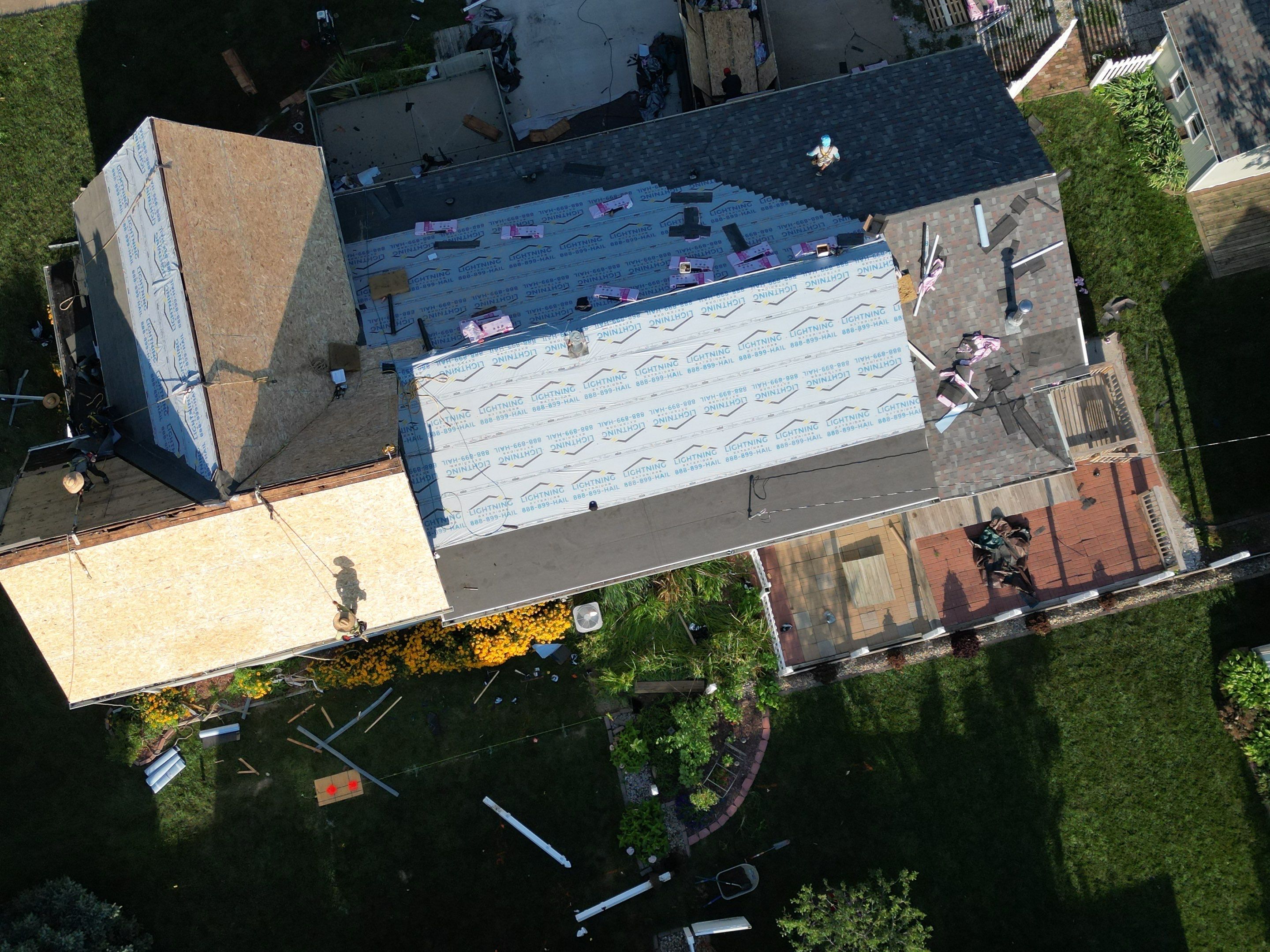 Residential Roofing Installation using Owens Corning Duration Colonial Slate by Lightning Exteriors