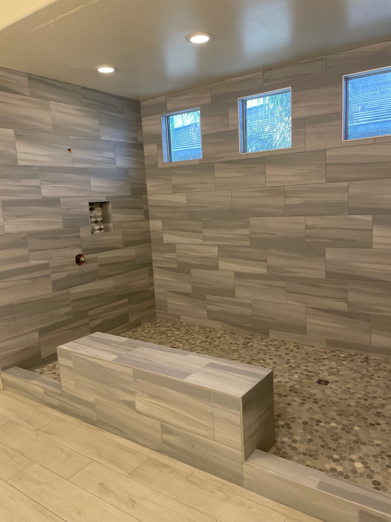 Wood Look Tile Floors and an Extra Large Shower  by Footprints Floors of Chandler 