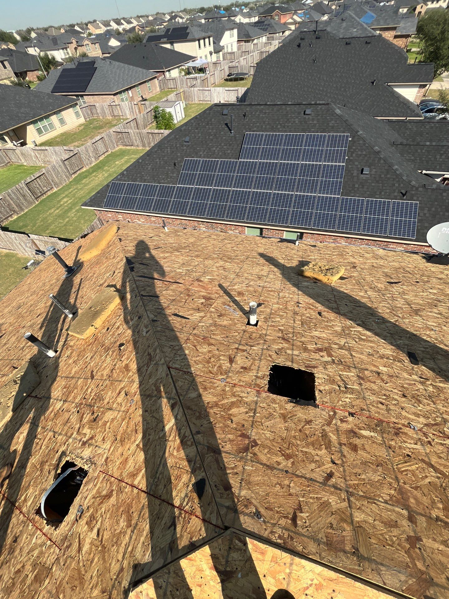 Reroof with Solar panel Detach and Reset by Berry Good Roofing 