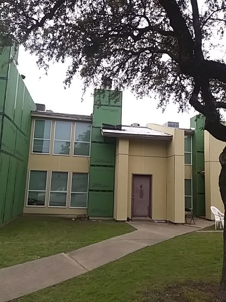 Apartment Roof Replacement by First Out Roofing