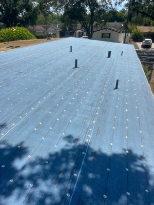 Residential Flat Roof Replacement and Decking Repair in Orlando