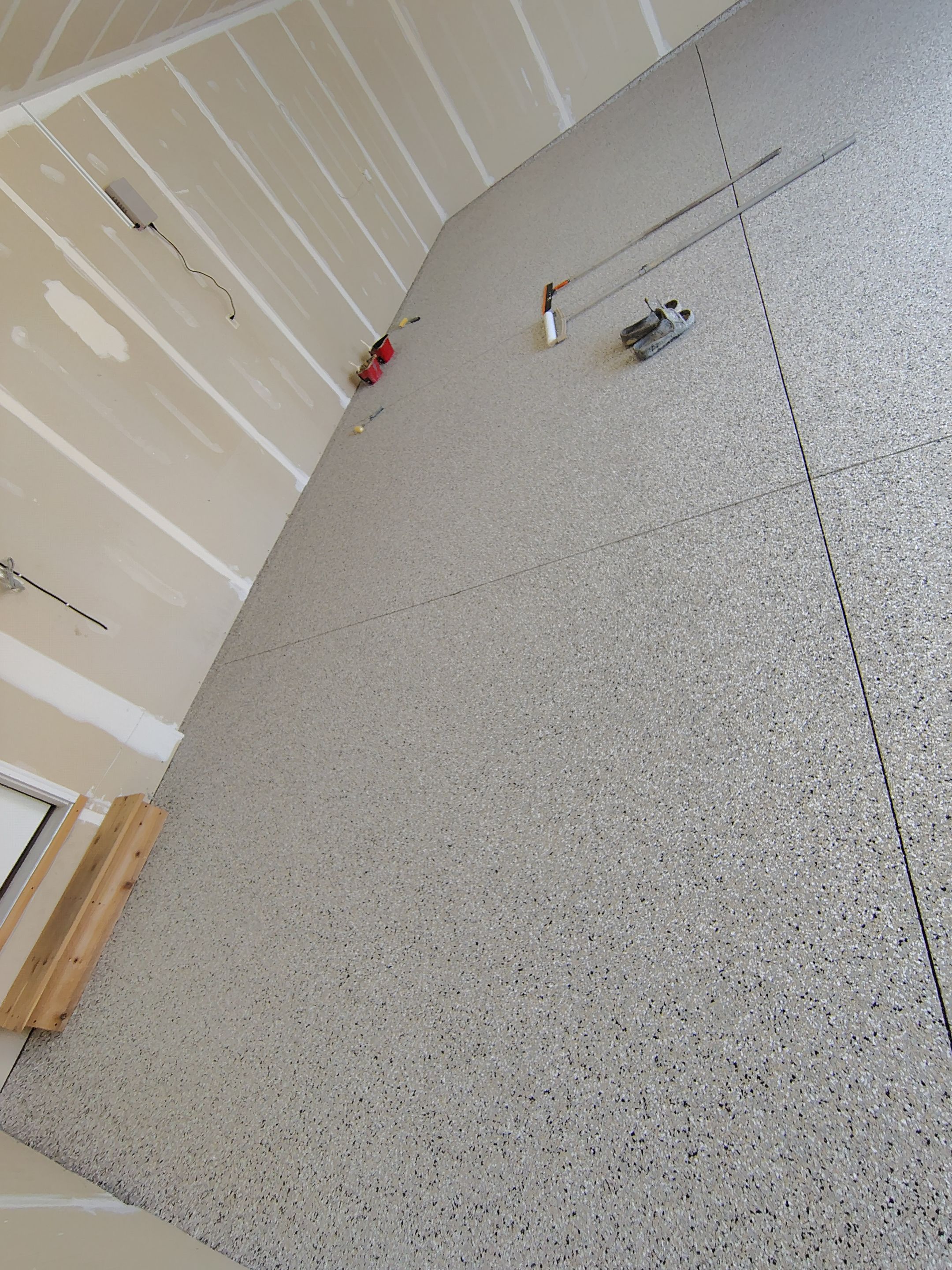 Epoxy Garage Floor Coating with Decorative Flake in Harrisburg by Select Painting, Coatings & Garage Cabinets