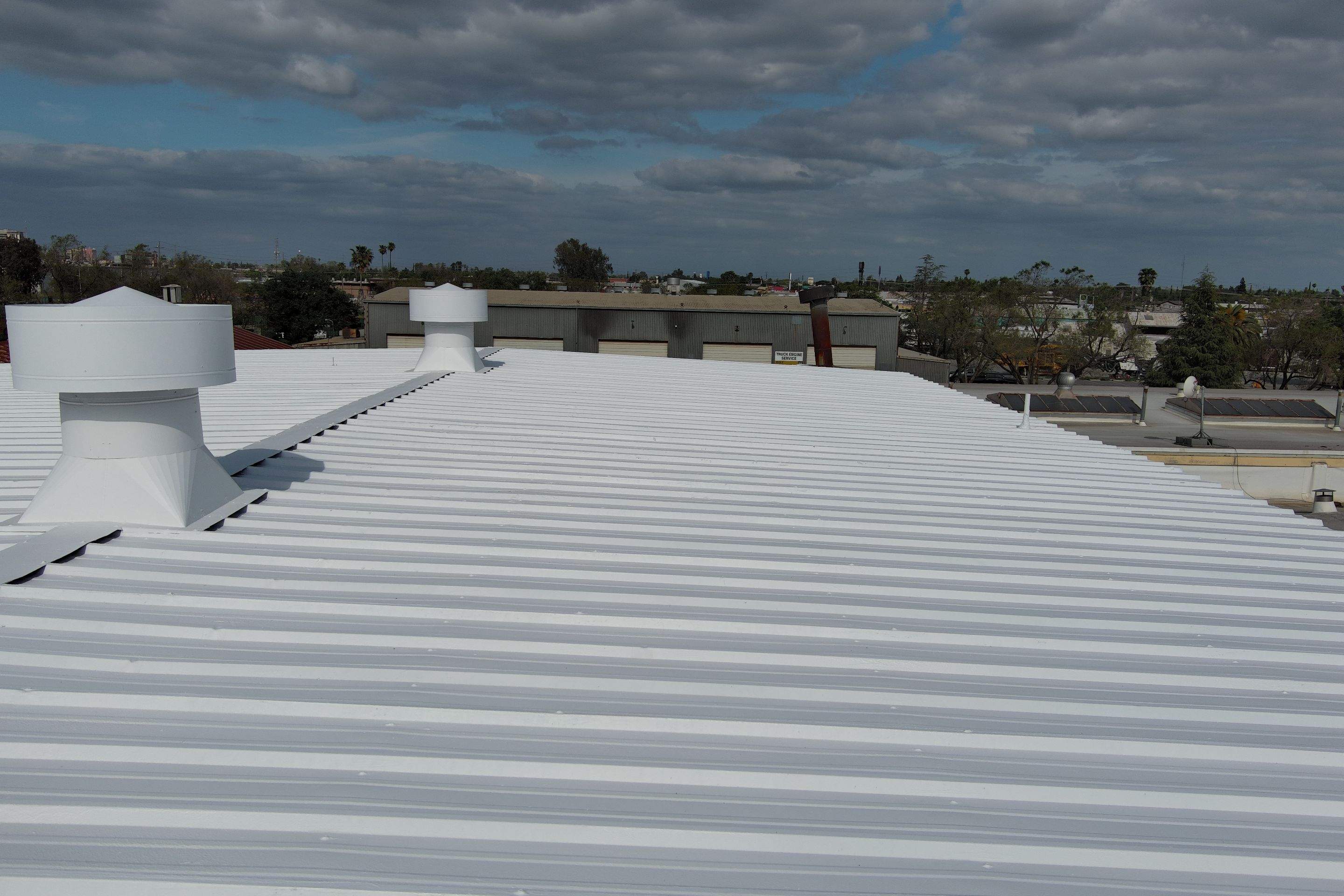 MR Roofing system using Conklin BenchPly system with PUMA top coat by Straight Edge Roofing Inc