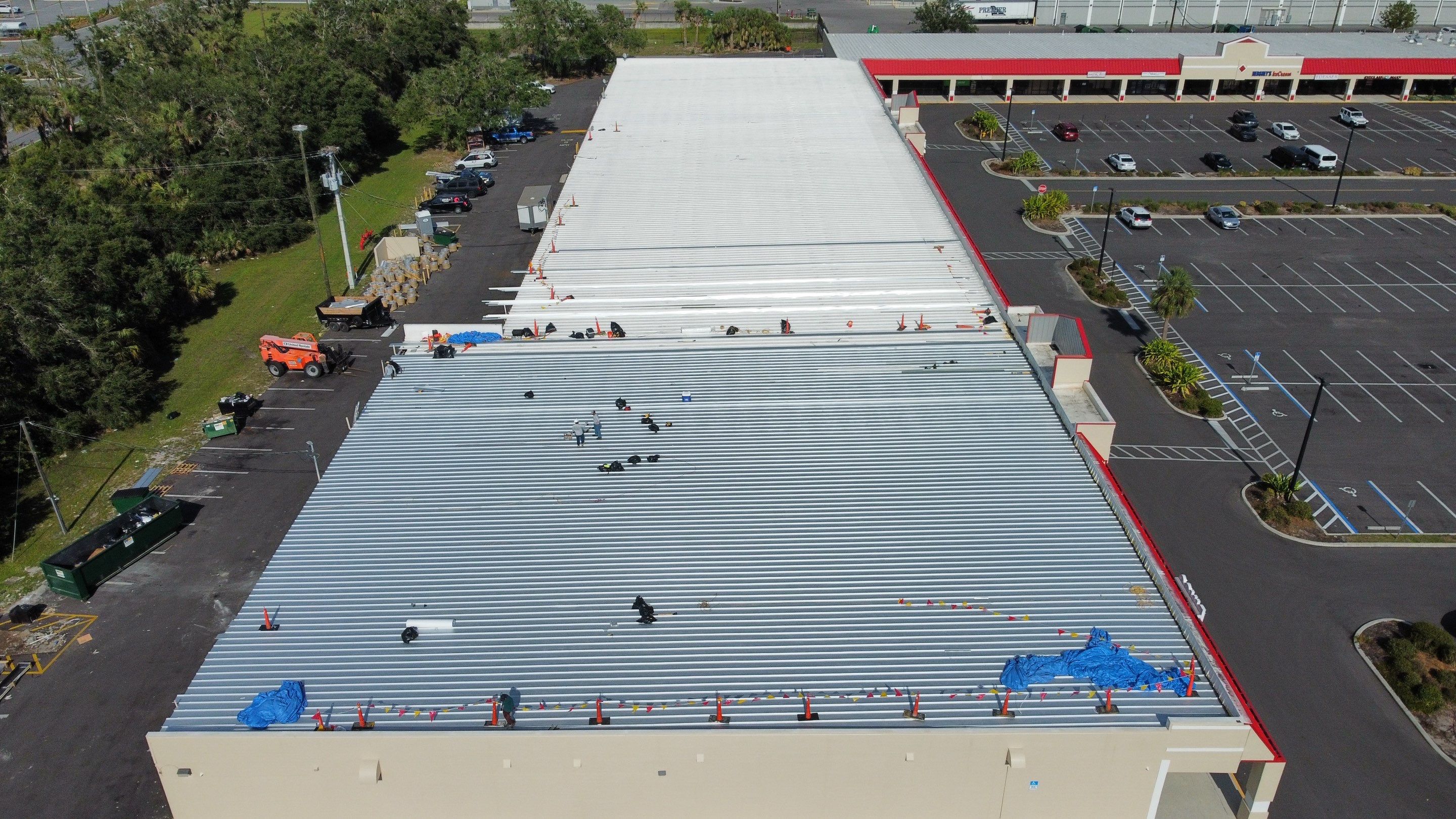 Commercial Metal Roof Replacement at Shopping Plaza in Port Charlotte by CES Roofing
