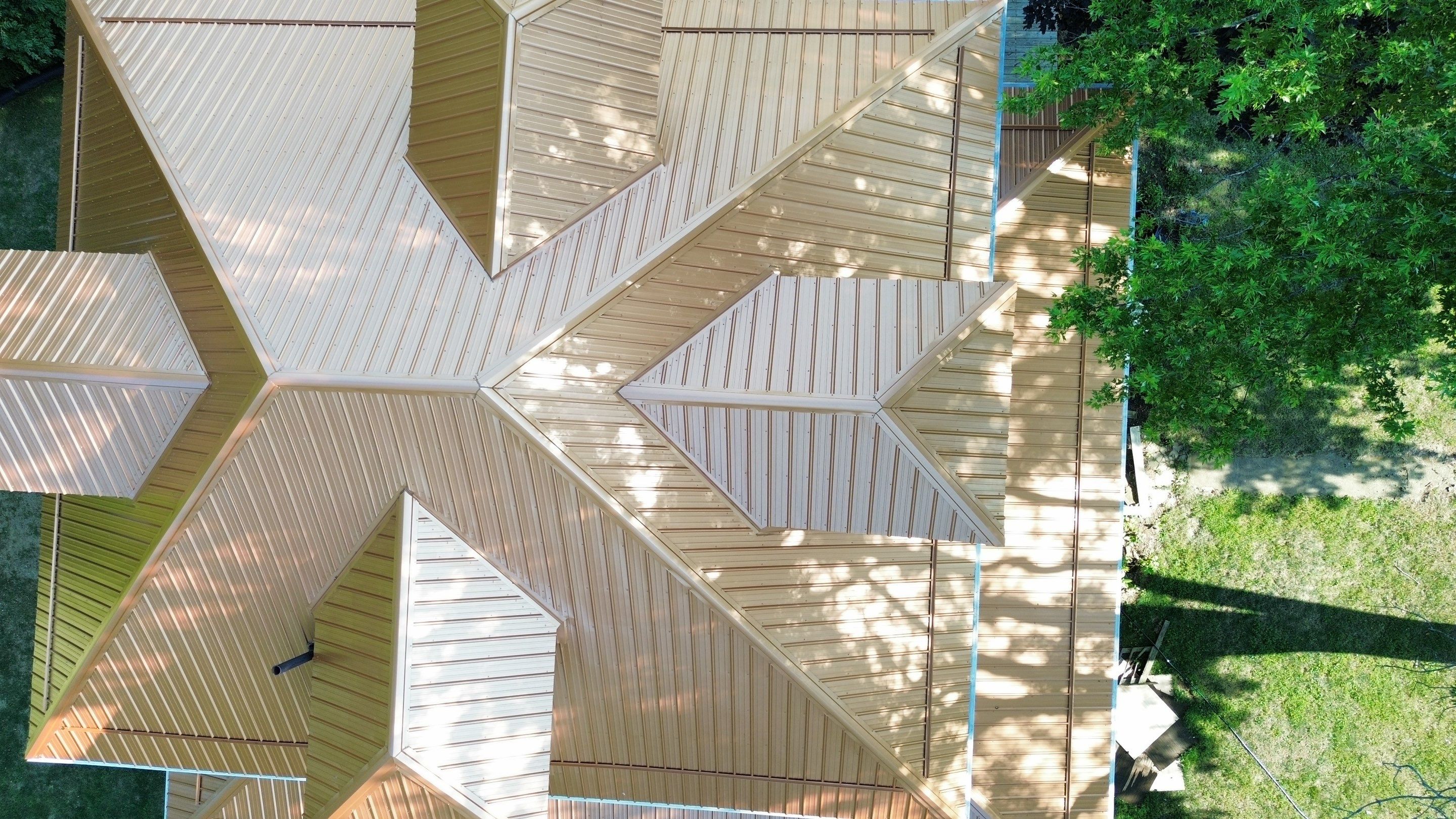 Residential Roofing Installation using Performance Panel Metal - Copper Metallic by RoofX 