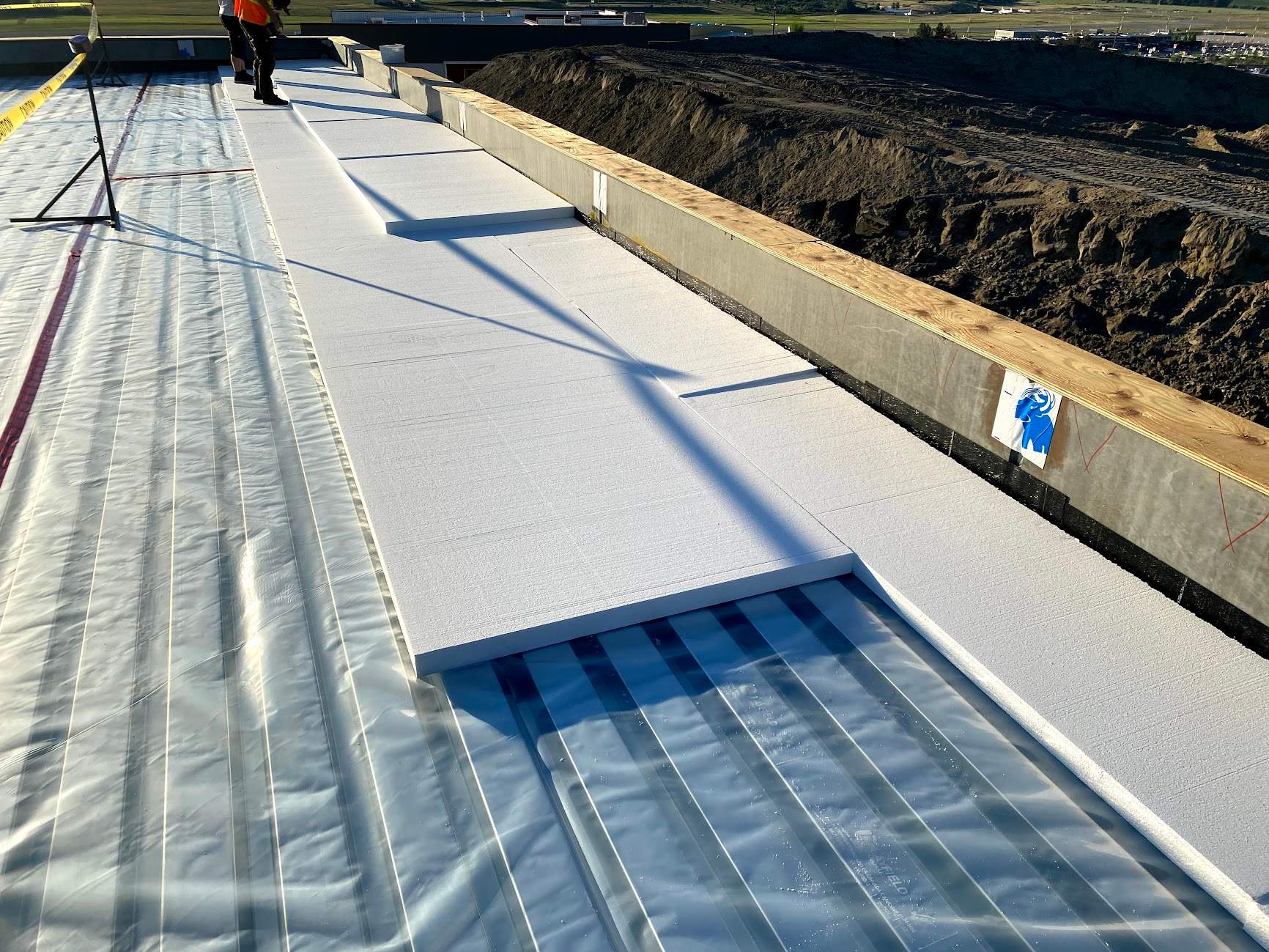 Commercial Roofing Installation using Durolast by Top Notch Roofing Inc