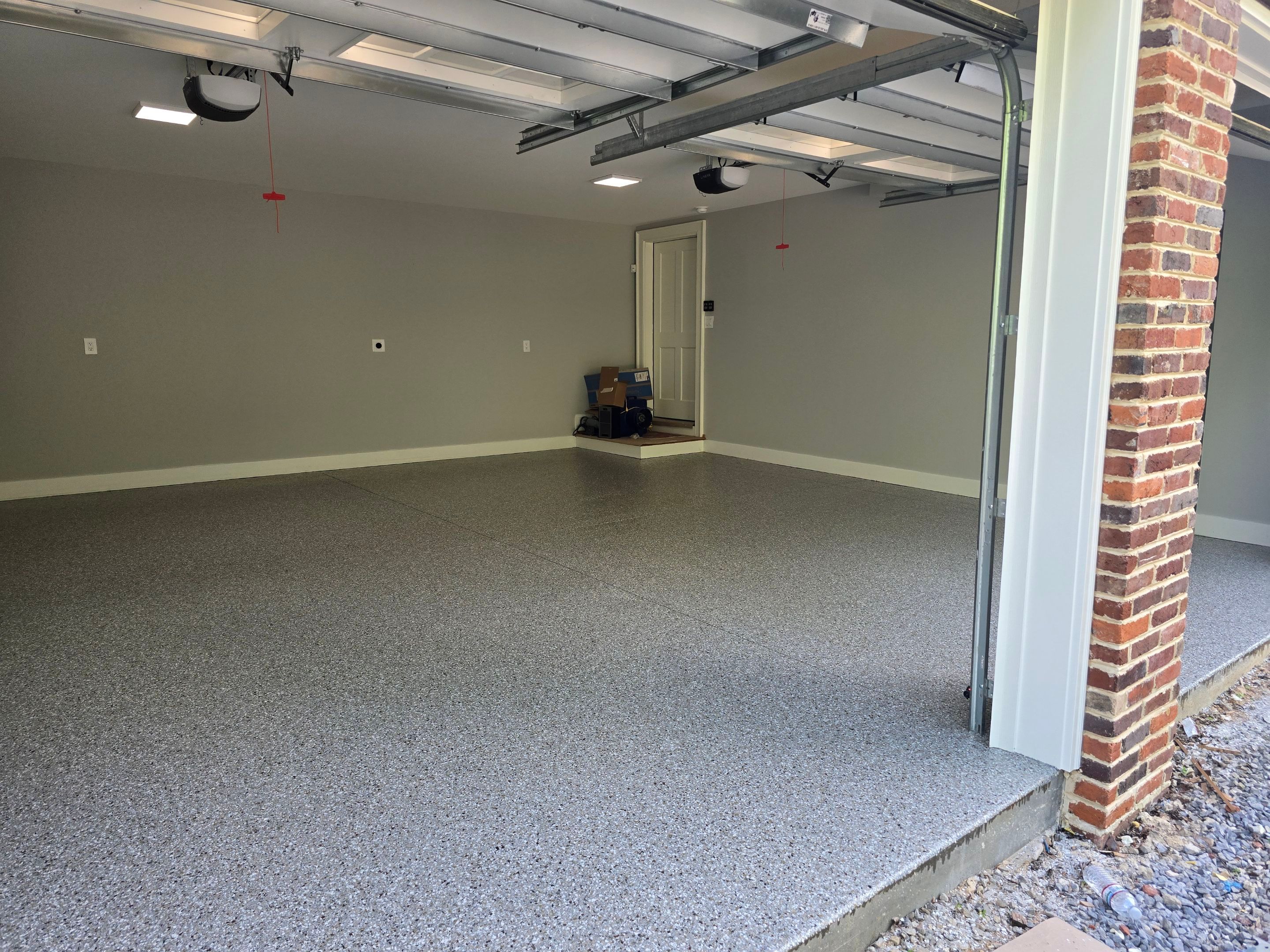 Two Garages Using Creekbed  by Elite Floor Solutions