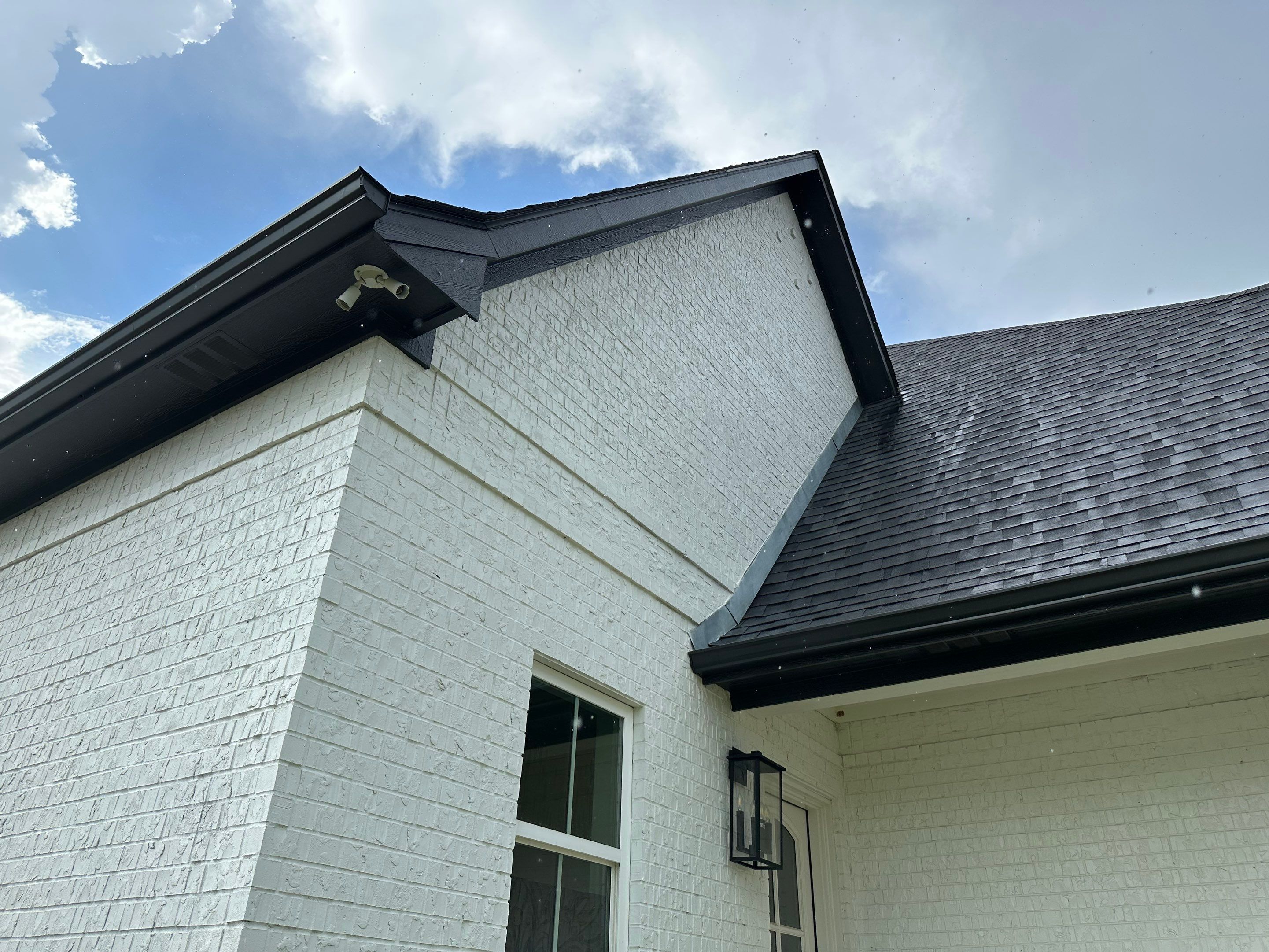 Exterior Painting in Longview, TX | Roof & Eaves in Elegant Black by Quality Coats Painting