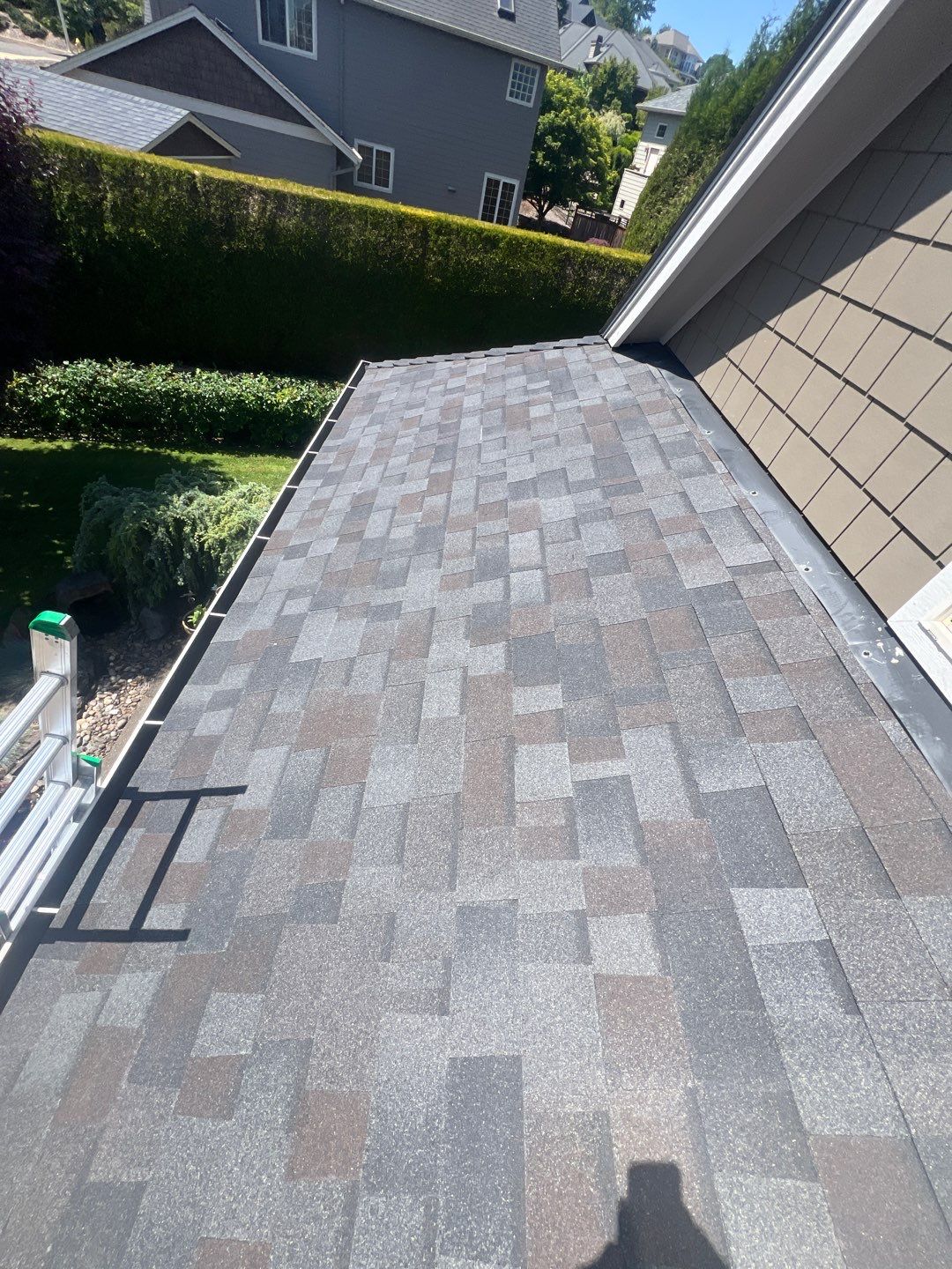 Residential Roofing Installation using Malarkey Vista (Color: Black Oak) by Orezona Building & Roofing Company, Inc.